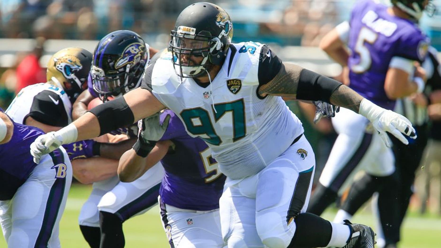 Sep 25, 2016; Jacksonville, FL, USA; Jacksonville Jaguars defensive tackle Roy Miller (97) protects the line during the first quarter of a football game against the Baltimore Ravens at EverBank Field. Mandatory Credit: Reinhold Matay-USA TODAY Sports