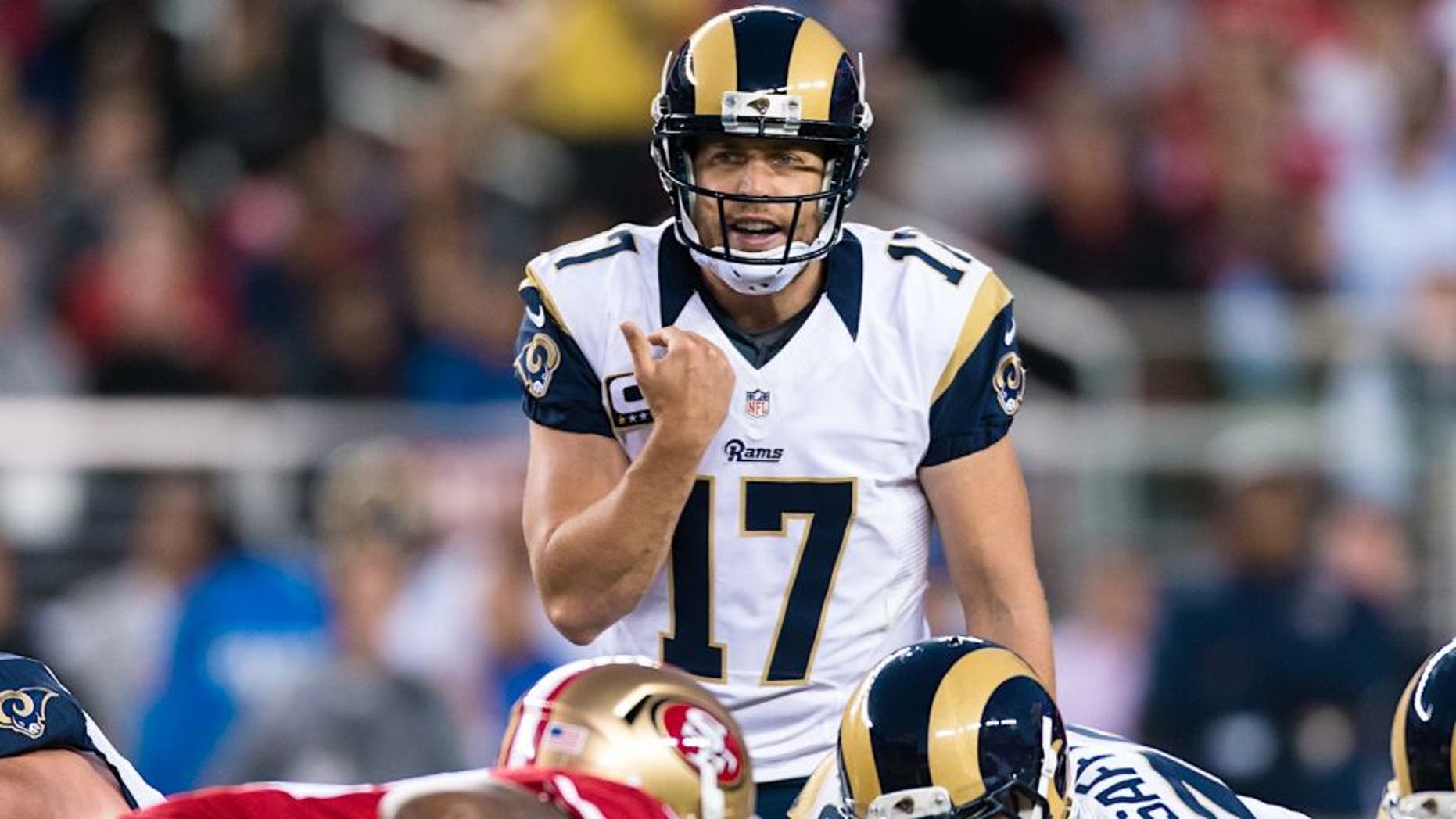 Sep 12, 2016; Santa Clara, CA, USA; Los Angeles Rams quarterback Case Keenum (17) calls the play against the San Francisco 49ers in the first quarter at Levi's Stadium. Mandatory Credit: John Hefti-USA TODAY Sports