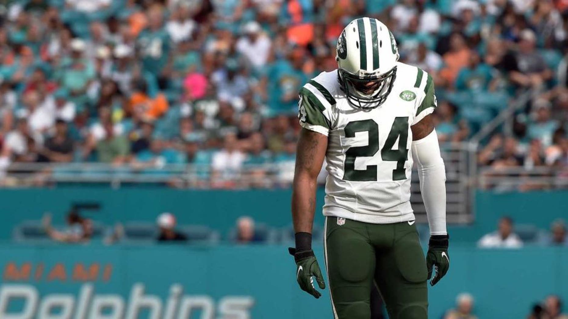 Nov 6, 2016; Miami Gardens, FL, USA; New York Jets cornerback Darrelle Revis (24) reacts during the second half against Miami Dolphins at Hard Rock Stadium. The Dolphins won 27-23. Mandatory Credit: Steve Mitchell-USA TODAY Sports