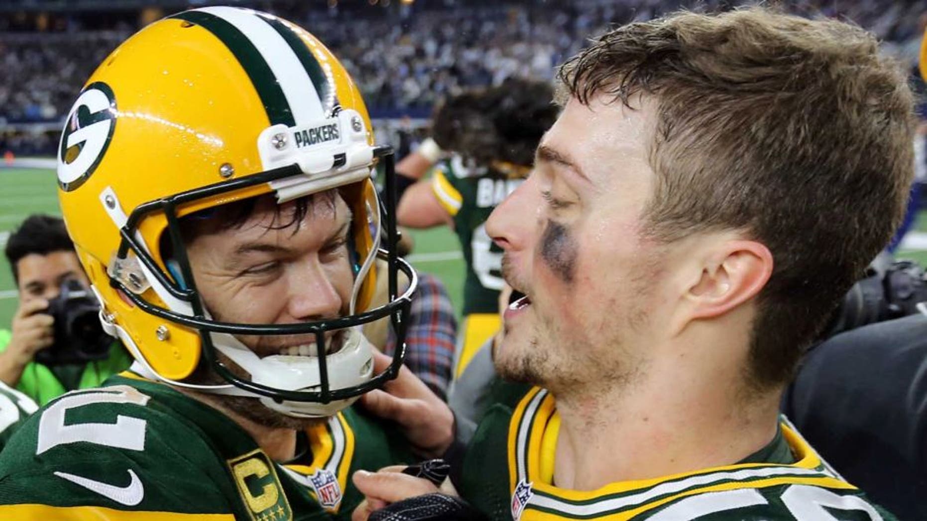 Jan 15, 2017; Arlington, TX, USA; Green Bay Packers kicker Mason Crosby (2) and Green Bay Packers outside linebacker Jordan Tripp (58) celebrate after beating the Dallas Cowboys in the NFC Divisional playoff game at AT&T Stadium. Mandatory Credit: William Glasheen/The Post-Crescant via USA TODAY NETWORK