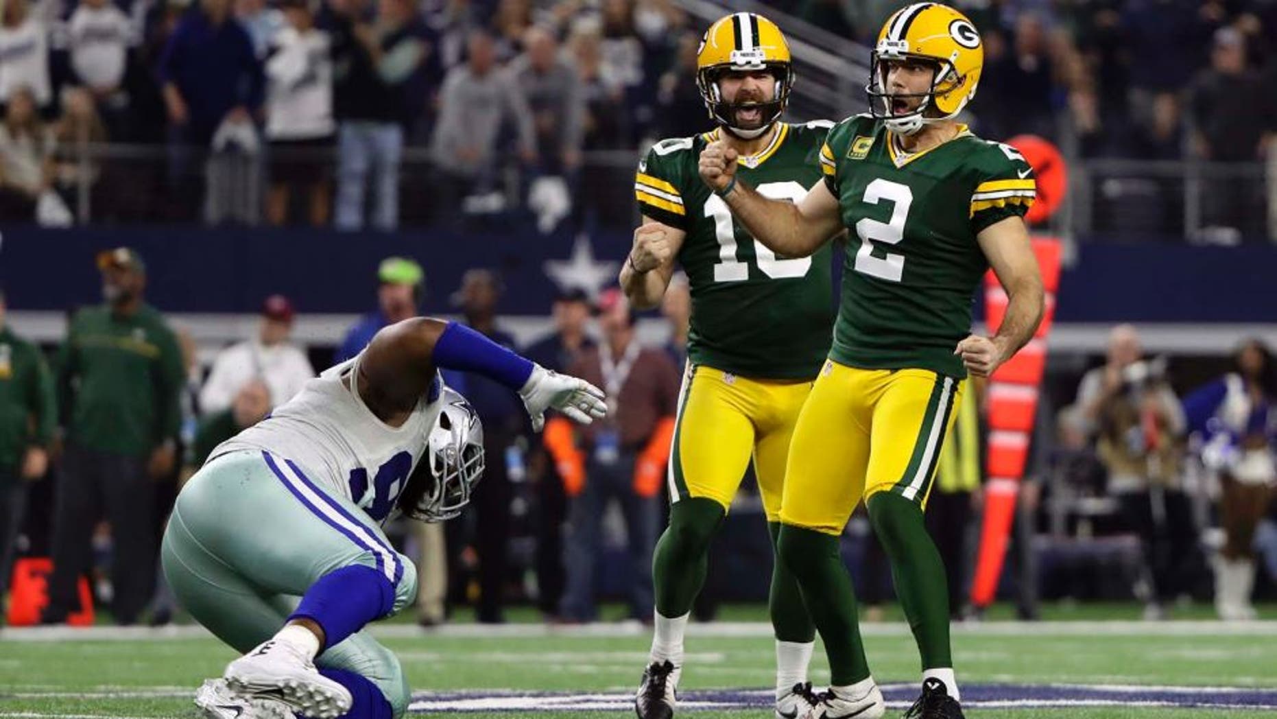 Jan 15, 2017; Arlington, TX, USA; Green Bay Packers kicker Mason Crosby (2) celebrates making a field goal in the NFC Divisional playoff game against the Dallas Cowboys at AT&T Stadium. Mandatory Credit: Kevin Jairaj-USA TODAY Sports