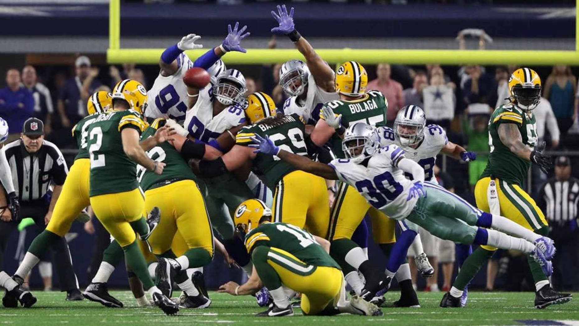 Jan 15, 2017; Arlington, TX, USA; Green Bay Packers kicker Mason Crosby (2) kicks the game winning field goal during the fourth quarter against the Dallas Cowboys in the NFC Divisional playoff game at AT&T Stadium. Mandatory Credit: Kevin Jairaj-USA TODAY Sports