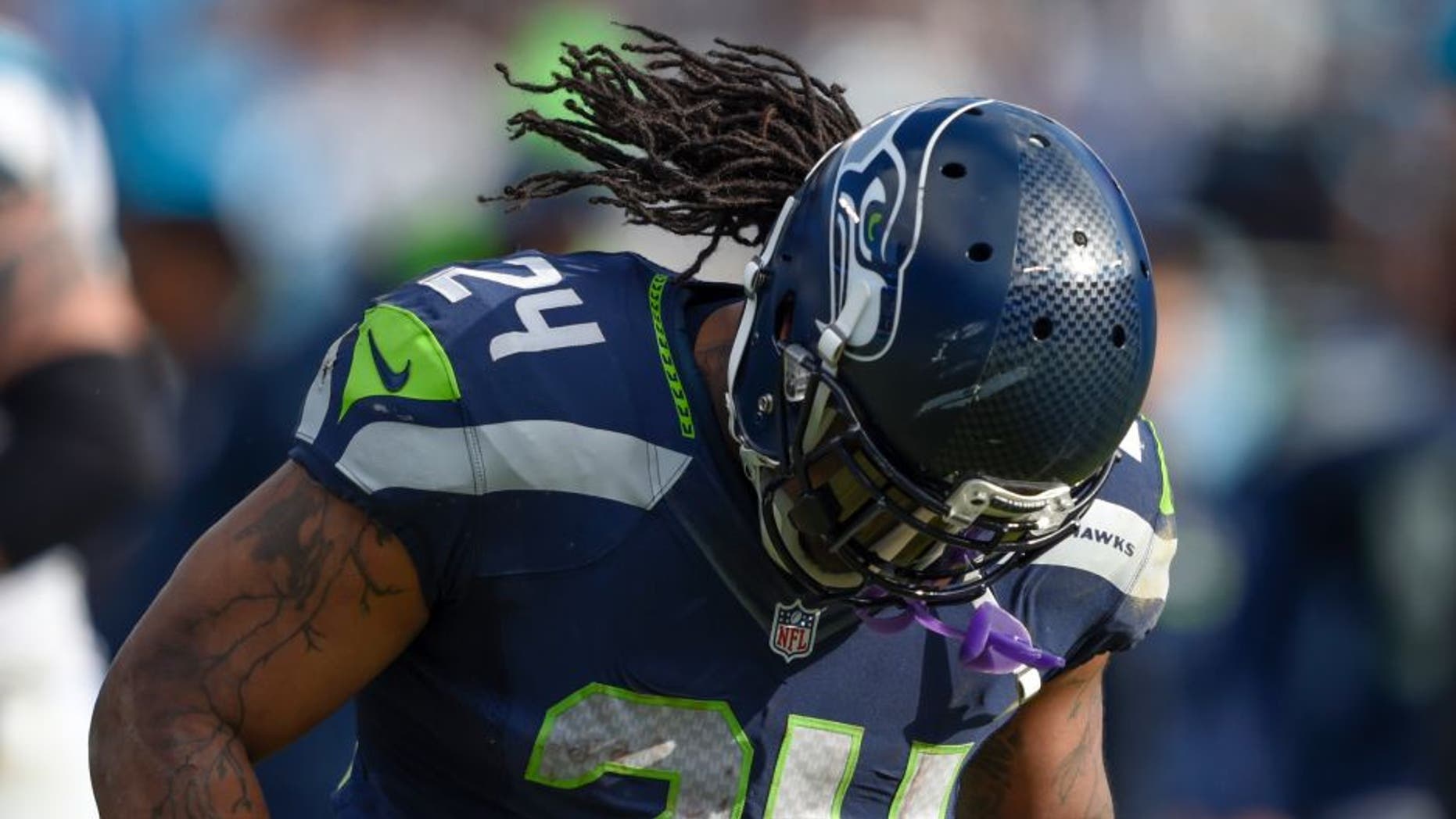 Jan 17, 2016; Charlotte, NC, USA; Seattle Seahawks running back Marshawn Lynch (24) reacts during the second quarter against the Carolina Panthers in a NFC Divisional round playoff game at Bank of America Stadium. Mandatory Credit: John David Mercer-USA TODAY Sports