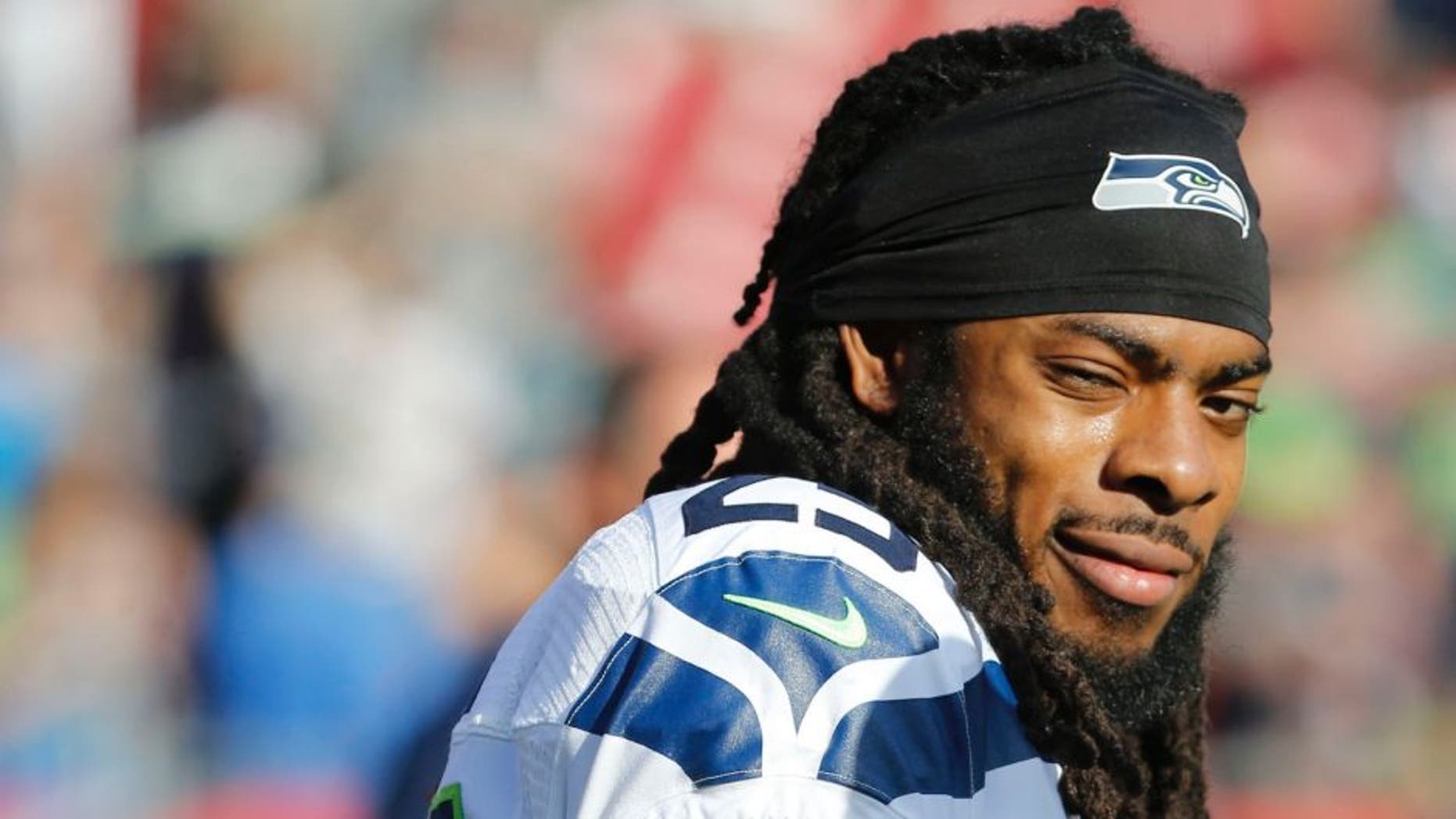 Nov 27, 2016; Tampa, FL, USA; Seattle Seahawks cornerback Richard Sherman (25) looks on prior to the game against the Tampa Bay Buccaneers at Raymond James Stadium. Mandatory Credit: Kim Klement-USA TODAY Sports