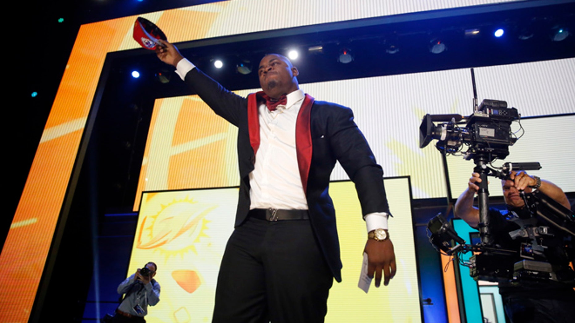 Mississippi States Chris Jones celebrates after being selected by the Kansas City Chiefs as the 37th pick in the second round of the 2016 NFL football draft, Friday, April 29, 2016, in Chicago. (AP Photo/Charles Rex Arbogast)