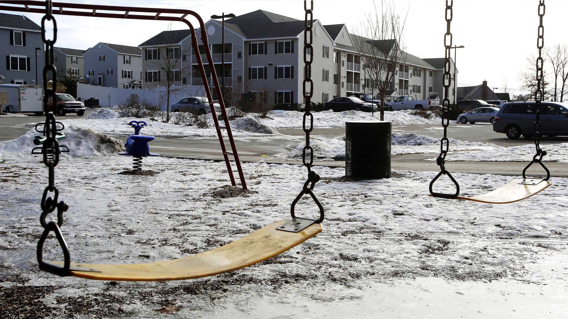 Jan. 22, 2015: An empty playground is seen at an apartment complex in Manchester, N.H.