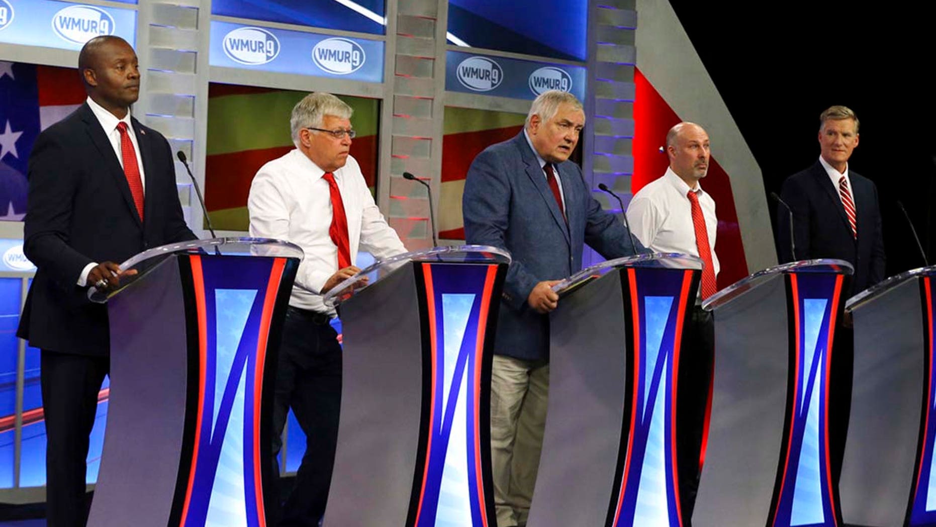 Republican hopefuls for New Hampshire's 1st Congressional District, from left to right, Eddie Edwards, Michael Callis, Andy Martin, Jeffory Denaro and Andy Sanborn participate in a debate at St. Anselm College in Manchester, N.H., Sept. 6.