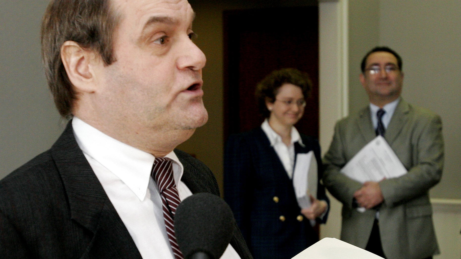 FILE: Rep. Steve Vaillancourt, left, criticizes the state's gay marriage panel as its chairman, Rep. Tony Soltani, R-Epsom, right, and its clerk Maureen Mooney, R-Merrimack, center, look on prior to a news conference in Concord, N.H.