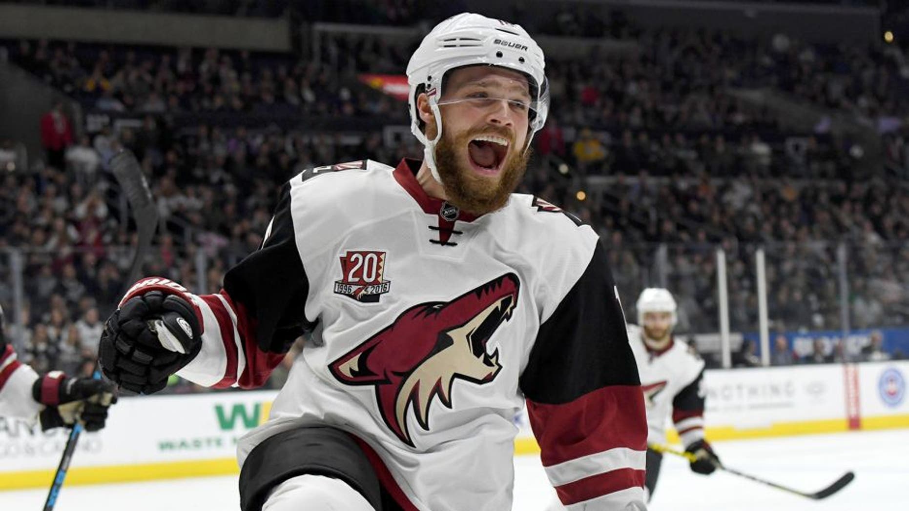 Mar 14, 2017; Los Angeles, CA, USA; Arizona Coyotes left wing Max Domi (16) celebrates after scoring a goal in the third period against the Los Angeles Kings at the Staples Center. The Coyotes defeated the Kings 3-2 in a shootout. Mandatory Credit: Kirby Lee-USA TODAY Sports