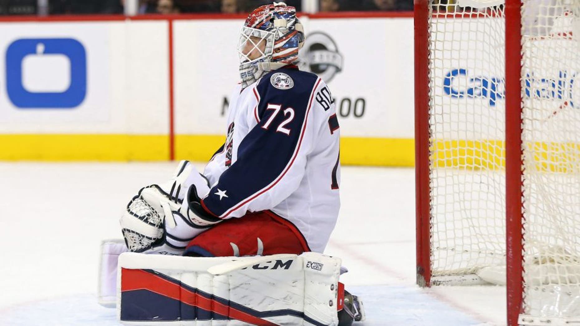 Jan 5, 2017; Washington, DC, USA; Columbus Blue Jackets goalie Sergei Bobrovsky (72) kneels on the ice after giving up a goal to Washington Capitals left wing Andre Burakovsky (not pictured) in the second period at Verizon Center. Mandatory Credit: Geoff Burke-USA TODAY Sports