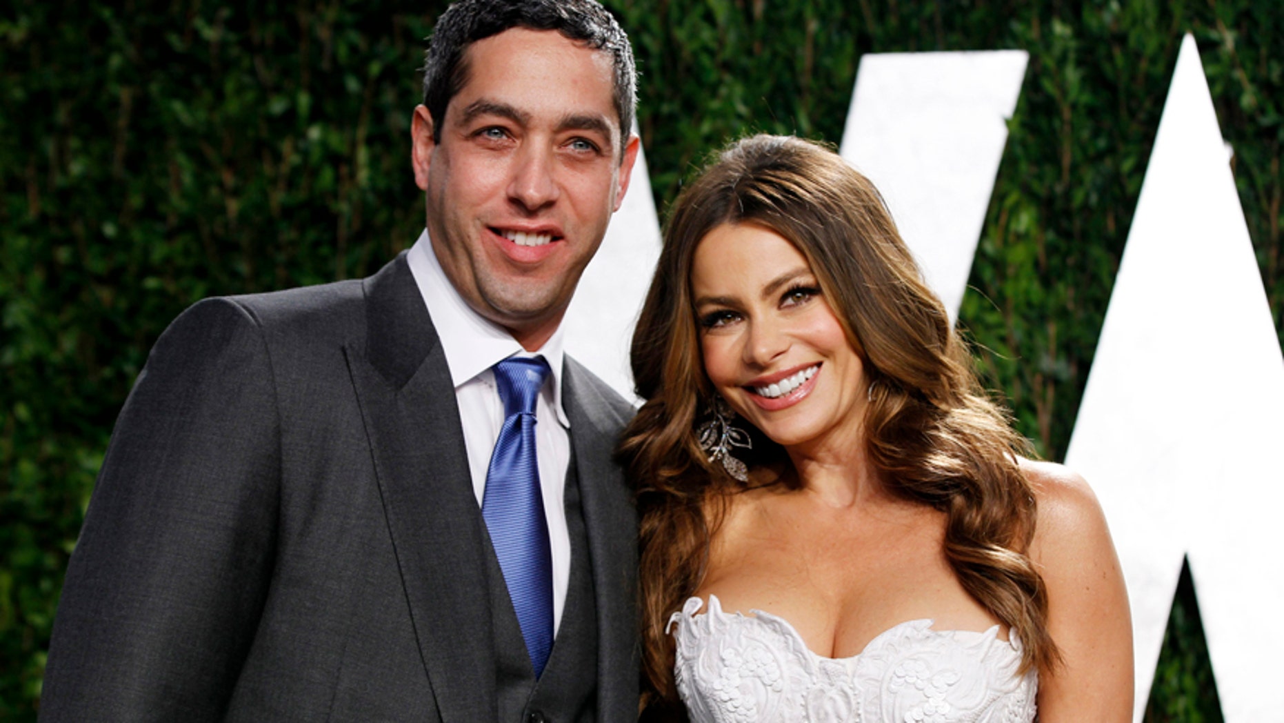 Actress Sofia Vergara and Nick Loeb arrive at the 2012 Vanity Fair Oscar party in West Hollywood, California February 26, 2012.