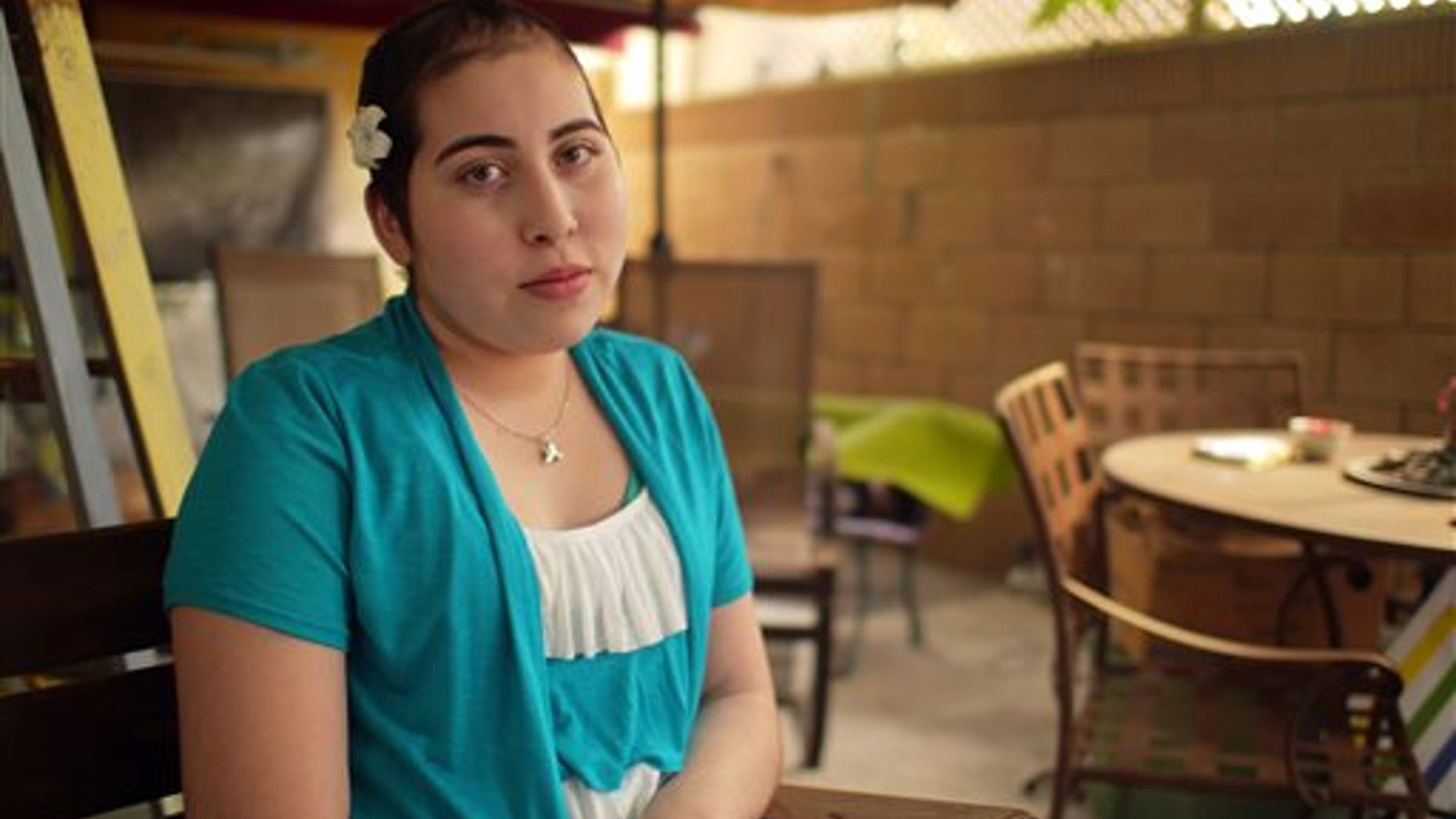 This image released by Nick News shows Nohemy Ruiz, 15, who was diagnosed with brain cancer. Ruiz will appear on the upcoming episode of "Nick News with Linda Ellerbee," titled, "Before I Go Living with Dying" airing on Nickelodeon on Sunday at 8 p.m. EDT. (Lucky Duck Productions/Nick News via AP)