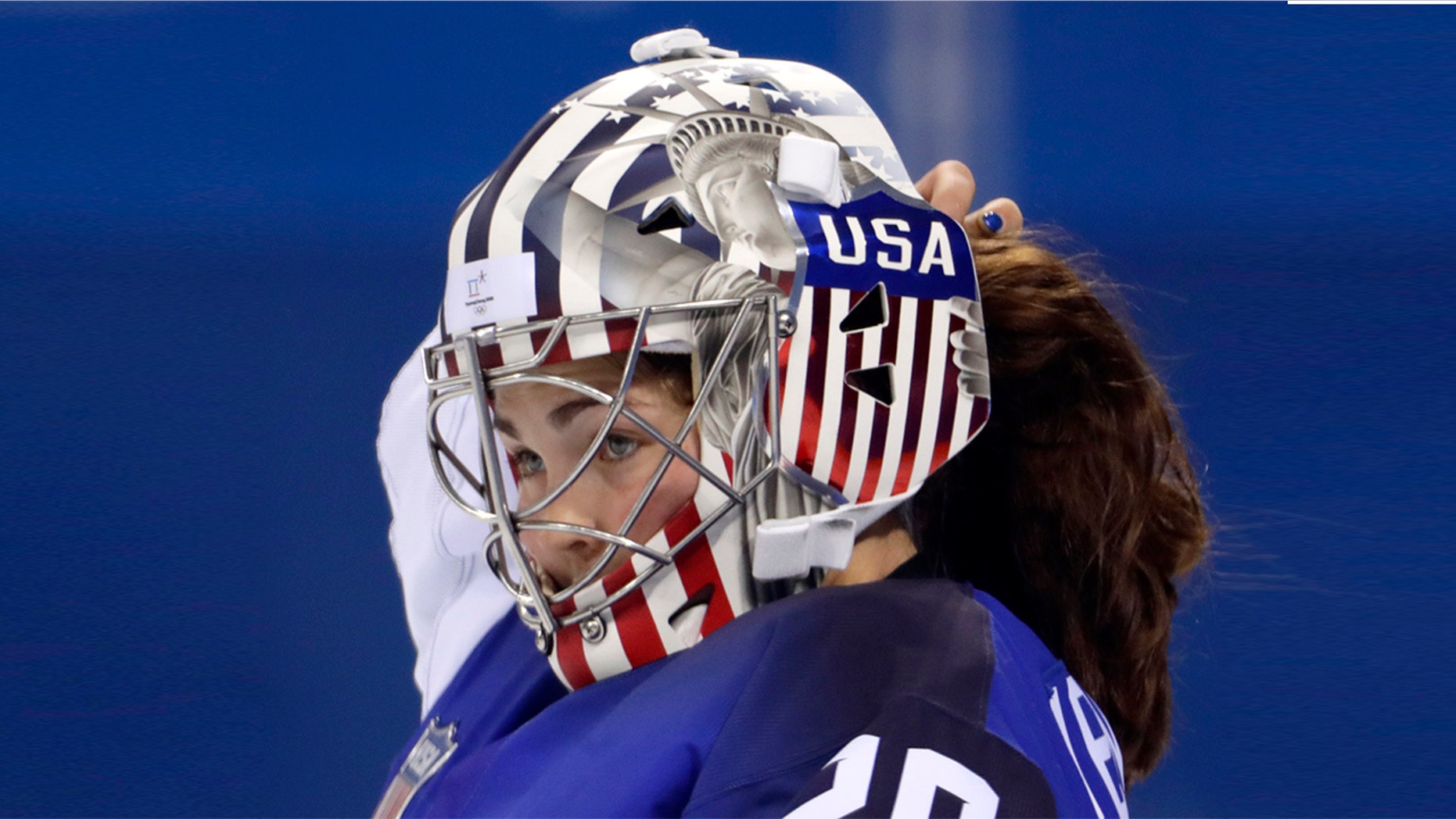 Team USA hockey goalkeeper Nicole Hensley, pictured, has been cleared by the International Olympic Committee to display the Statue of Liberty on her helmet as she competes in the 2018 Winter Games.