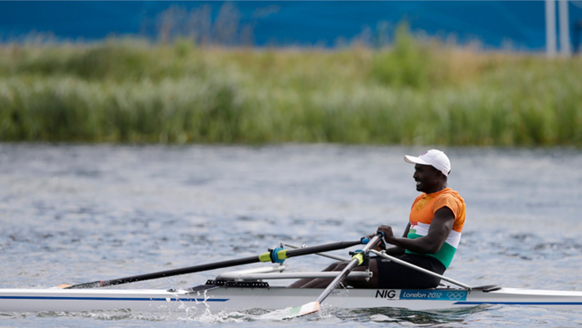 July 29, 2012: Niger's Hamadou Djibo Issaka strokes during a men's rowing single sculls repechage in Eton Dorney, near Windsor, England, at the 2012 Summer Olympics.