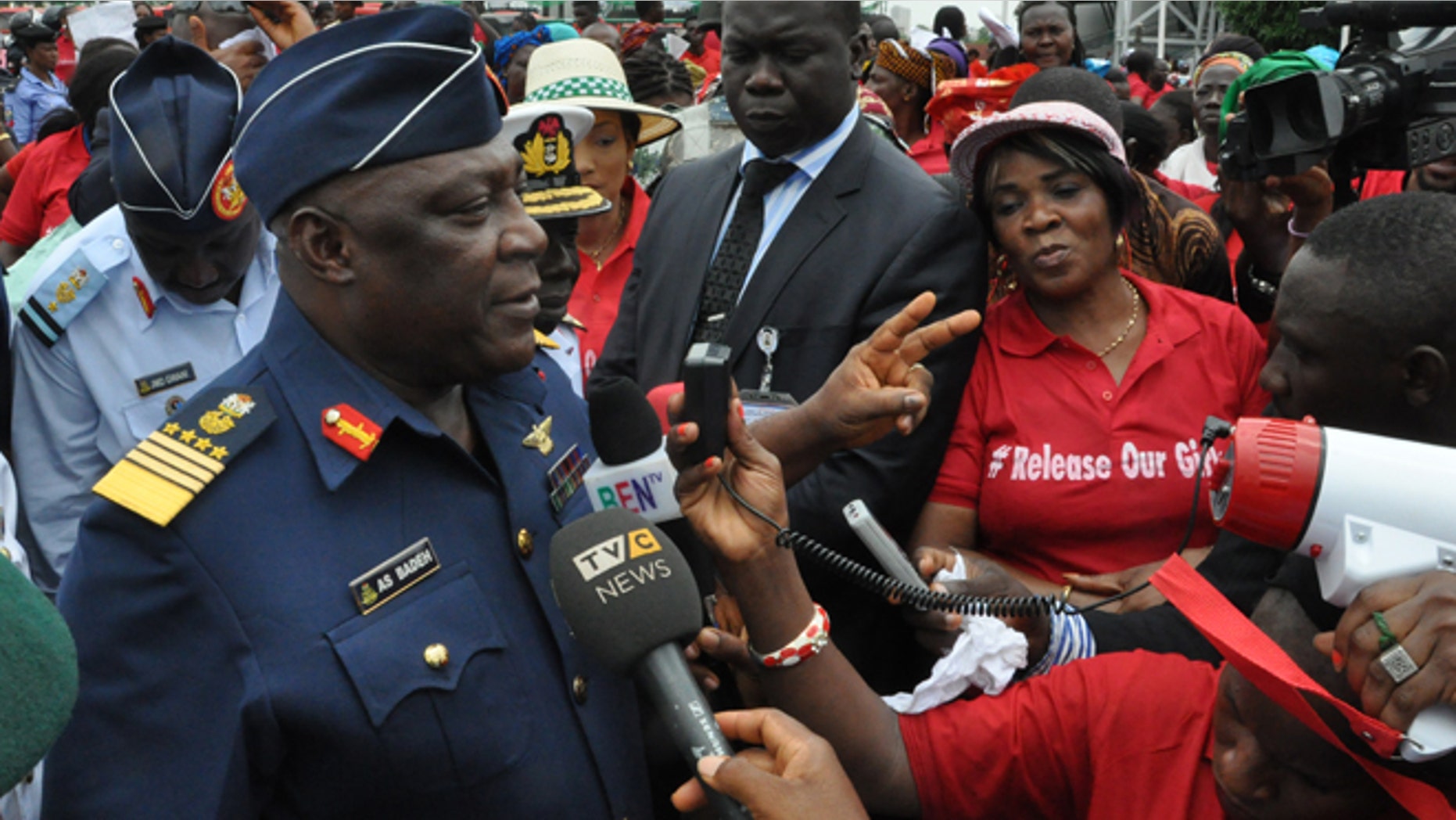 May 26, 2014: Nigeria's chief of defense staff Air Marshal Alex S. Badeh, center, speaks during a demonstration calling on the government to rescue the kidnapped girls of the government secondary school in Chibok, in Abuja, Nigeria, Monday.