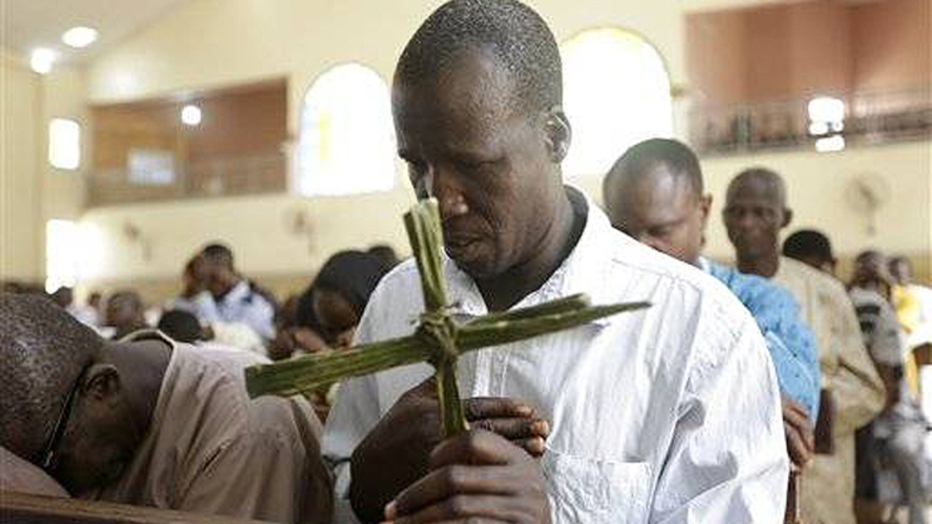 Nigerian Christians attend the Palm Sunday mass, at St Theresa's Catholic Church, in Yola, Nigeria, last month. (AP)