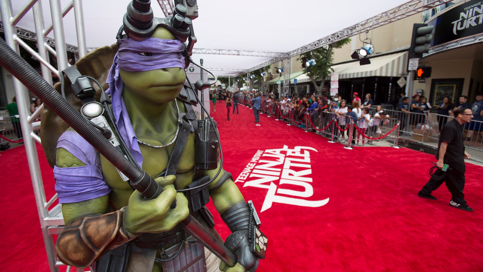 File photo: A life-size model of the character "Donatello" is pictured at the premiere of "Teenage Mutant Ninja Turtles" in Los Angeles, California August 3, 2014. (REUTERS/Mario Anzuoni)