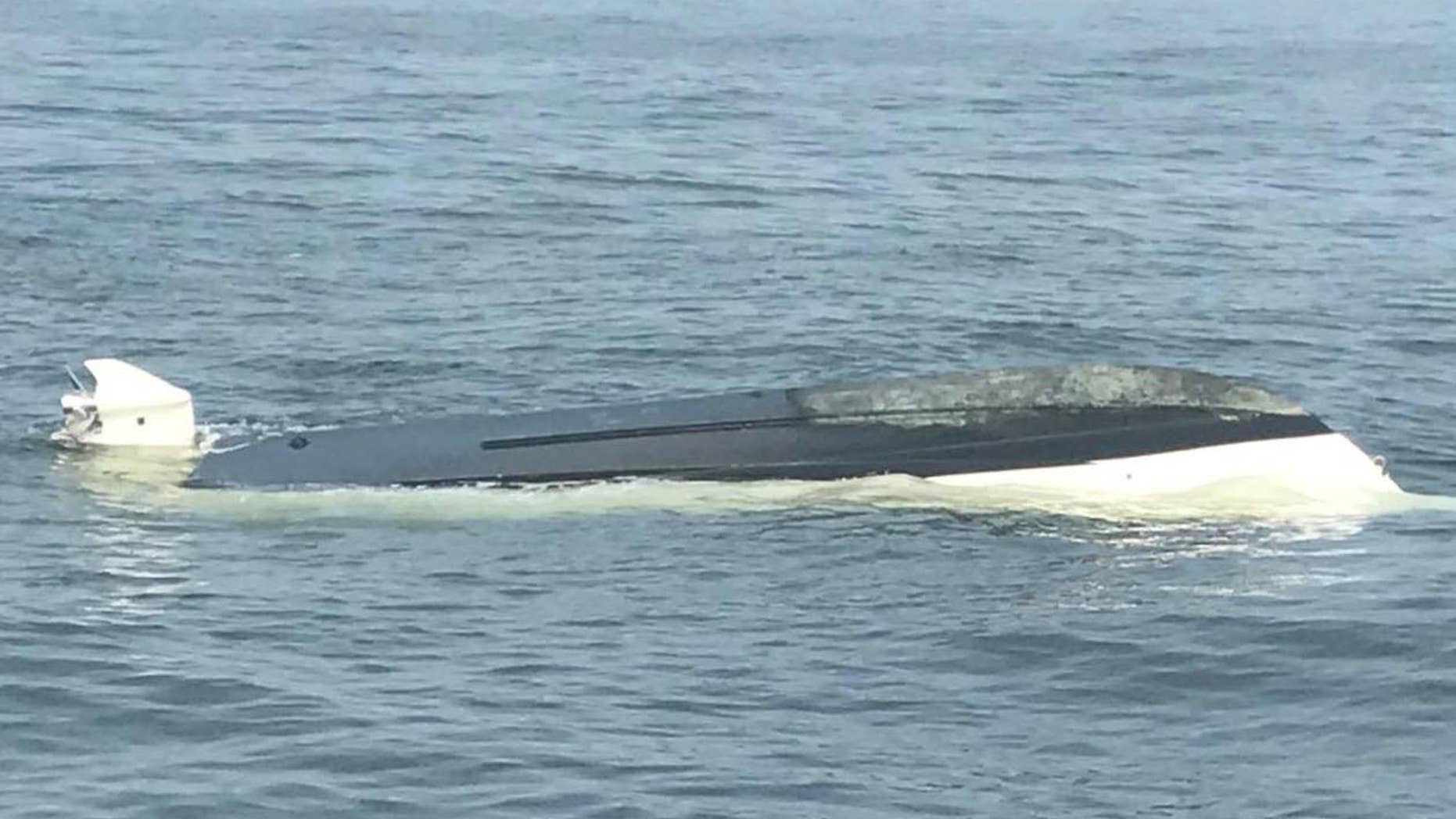 Police say that a whale hit a small fishing boat and caused it to capsize one mile off Deal, NJ.