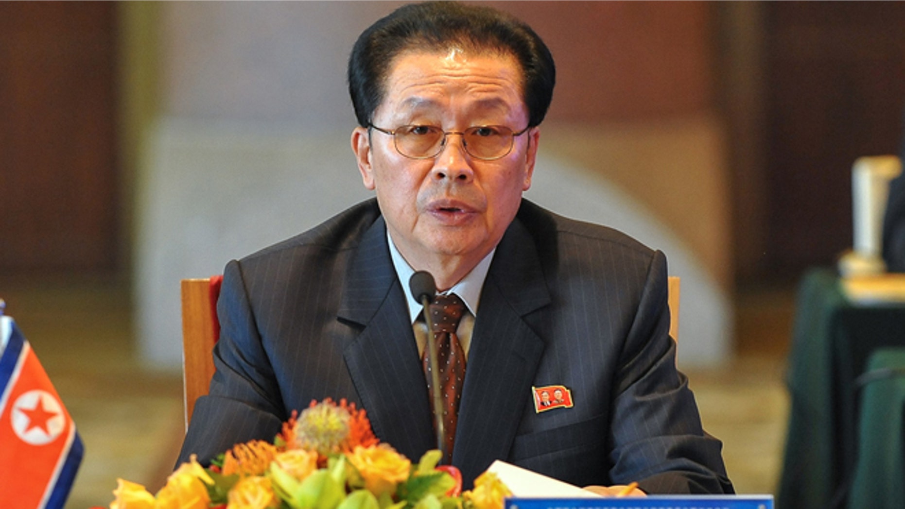 Aug. 14, 2012: In this file photo provided by China's Xinhua News Agency, Jang Song Thaek, North Korea's vice chairman of the powerful National Defense Commission, attends the third meeting on developing the economic zones in North Korea, in Beijing.