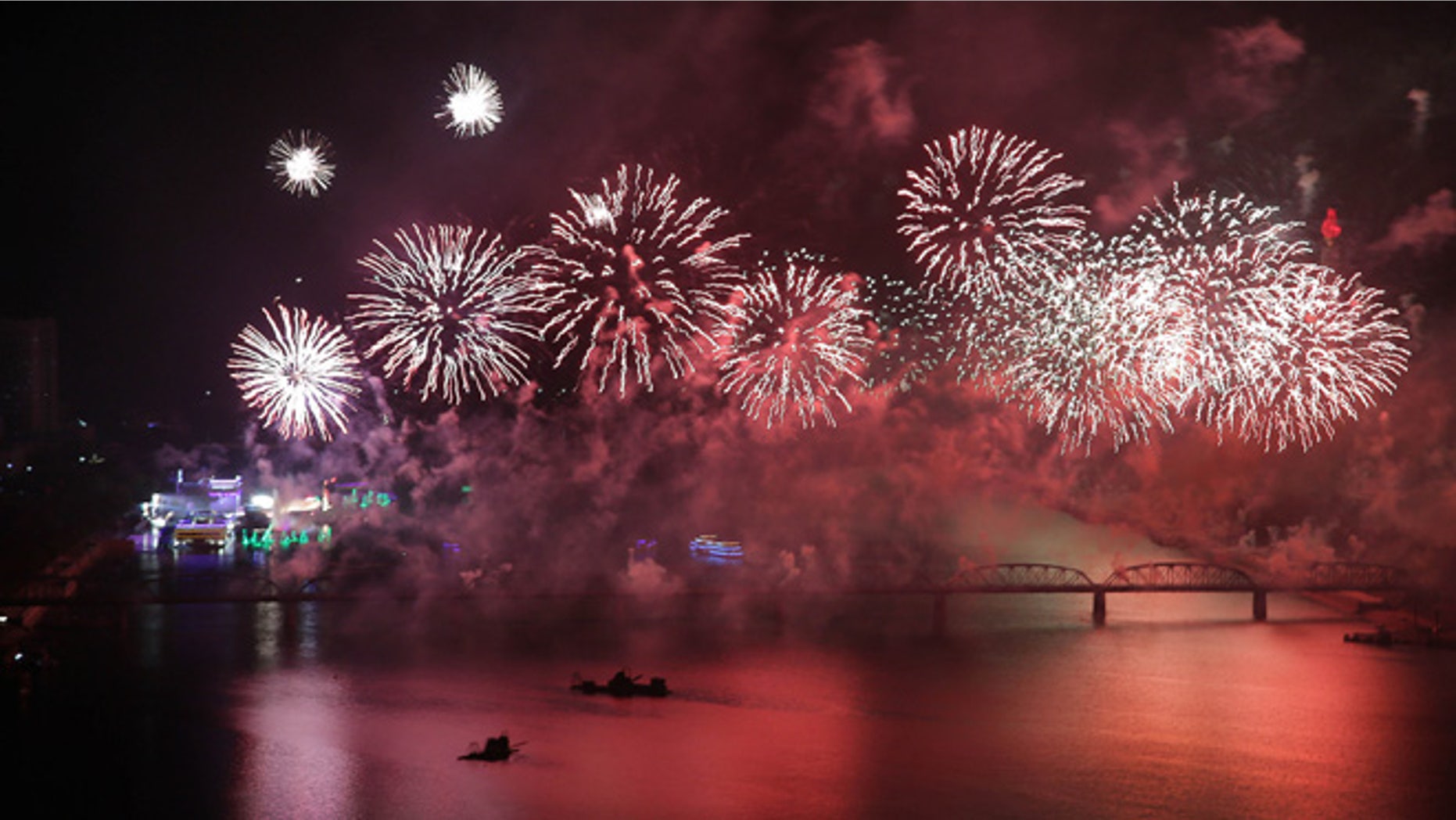 Oct. 12, 2015: Fireworks explode over the Taedong River as part of 70th anniversary celebrations of the founding of the ruling Workers' Party in Pyongyang, North Korea. (AP)