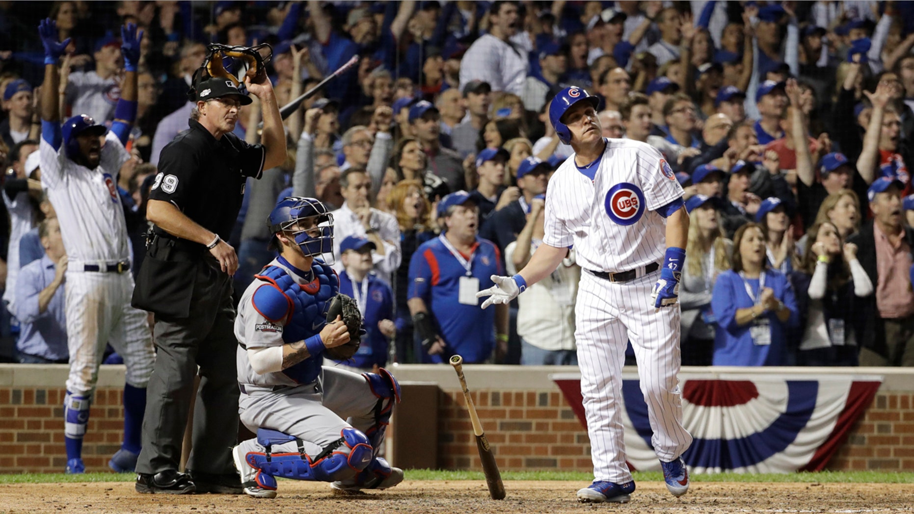 Oct. 15, 2016: Chicago Cubs catcher Miguel Montero (47) watches the ball as he hits a grand slam during the eighth inning of Game 1 of the National League baseball championship series against the Los Angeles Dodgers in Chicago