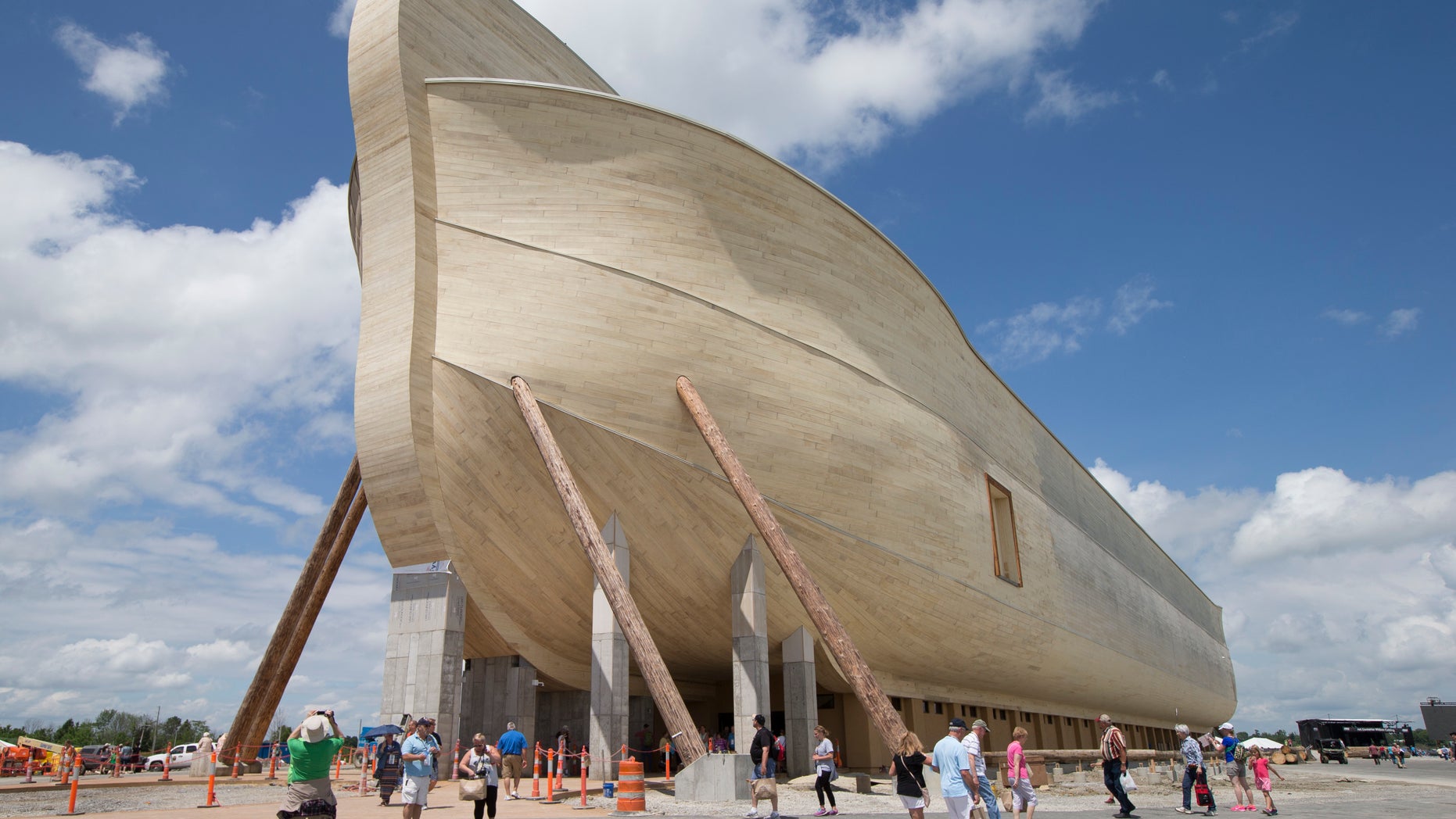July 5, 2016: Visitors pass outside the front of a replica Noah's Ark at the Ark Encounter theme park during a media preview day in Williamstown, Ky.