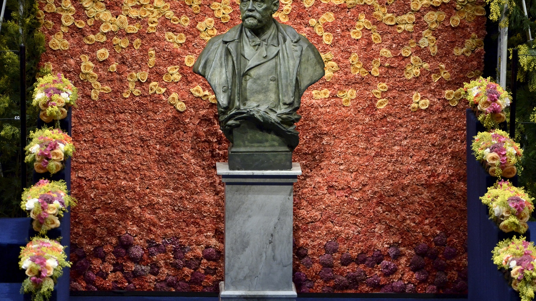 File photo - A bust of Swedish industrialist and armaments manufacturer Alfred Nobel is seen on the stage of Stockholm Concert Hall prior to the 2015 Nobel prize award ceremony Dec. 10, 2015. (REUTERS/Claudio Bresciani/TT News Agency)