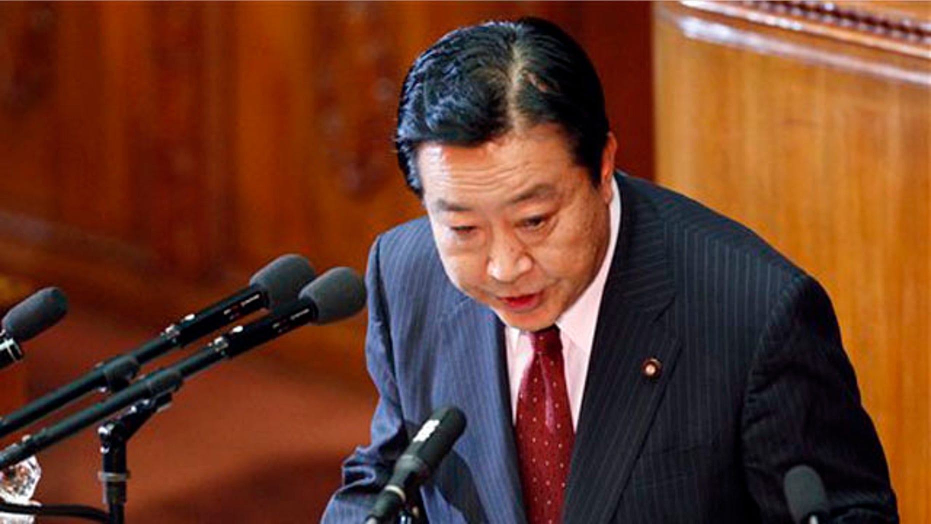 Japan's new Prime Minister Yoshihiko Noda delivers his policy speech during an extraordinary Diet session in Tokyo, Tuesday, Sept. 13, 2011.