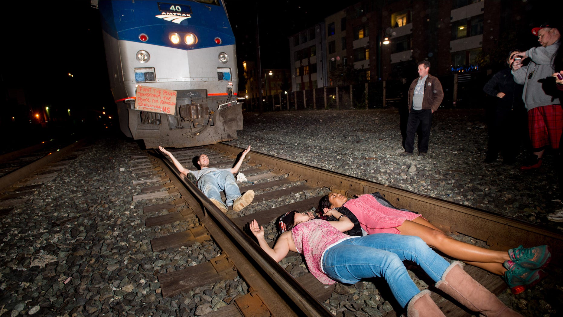DEc. 8, 2014: Protesters block an Amtrak train in Berkeley, Calif.