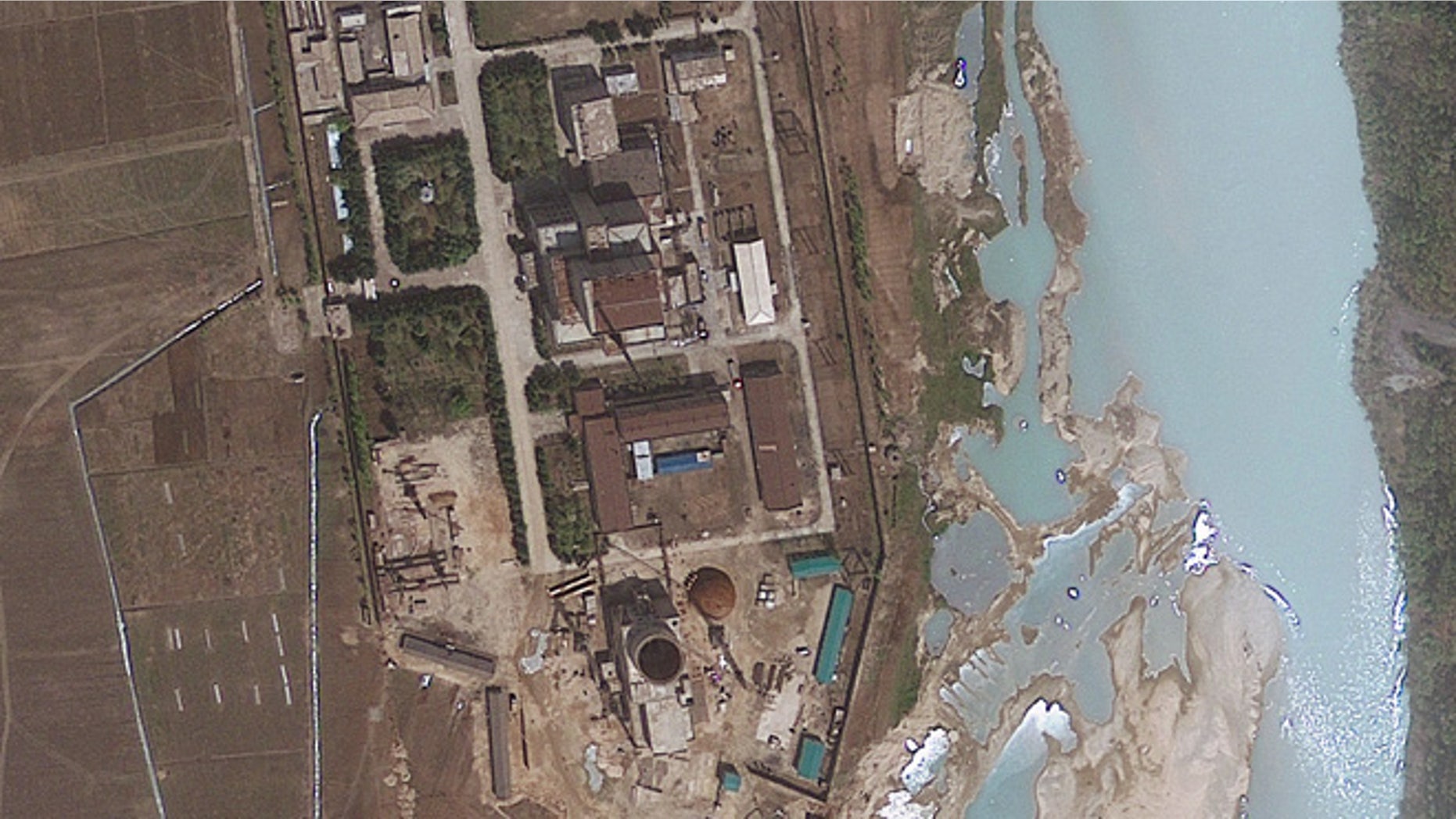 This April 30, 2012 file satellite image provided by GeoEye shows and area around the Yongbyon nuclear facility in Yongbyon, North Korea.