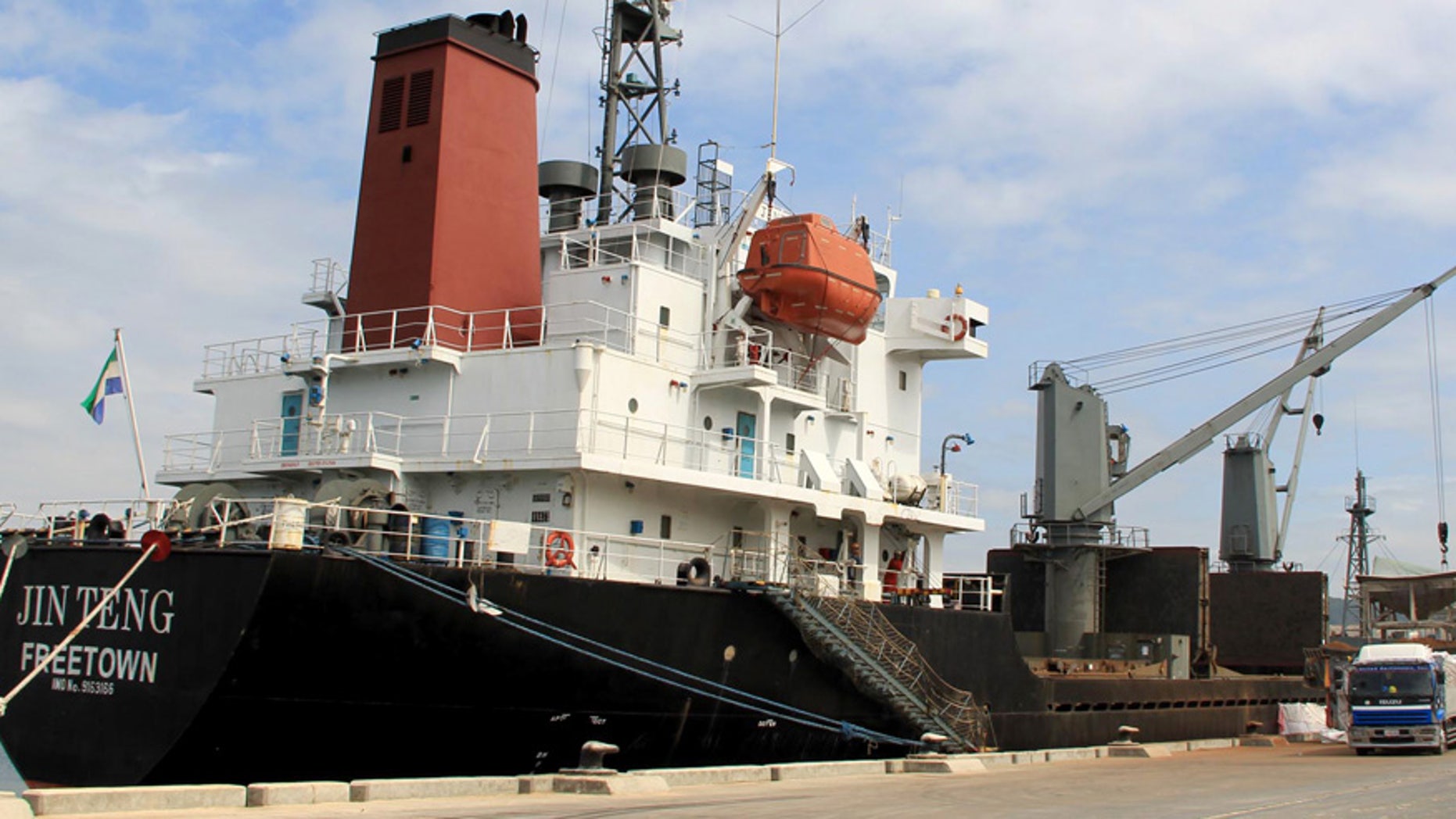 March 4, 2016: crewmen of the North Korean cargo vessel Jin Teng stand on the middle of the deck as it unloads its cargo while docked at Subic Bay, in Zambales province, northwest of Manila, Philippines.