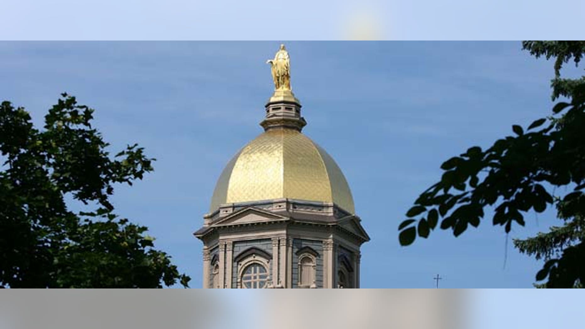 SOUTH BEND, IN - SEPTEMBER 2009: 19: A general view of the "Golden Dome" on the campus of Notre Dame University. A group of Catholic universities, including Notre Dame, criticized HHS for portions of the healthcare law. (Photo by Jonathan Daniel/Getty Images)