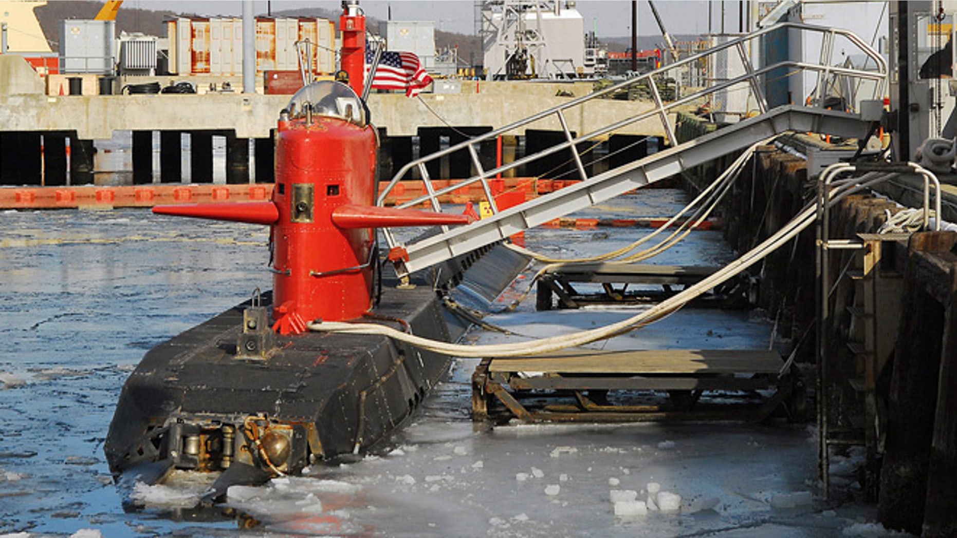 In this Feb. 2007 file photo provided by the U.S. Navy, the research submarine NR-1 is moored at U.S. Naval submarine base, in New London, Conn. The nuclear-powered NR-1, launched in Groton in 1969, was one of the most secretive vessels in the U.S. undersea force. It was taken out of service in 2008 and disassembled, its reactor disposed of. Now the Navy has collected pieces of it for an exhibit at a submarine museum in Groton, where it was based for the duration of its service life.