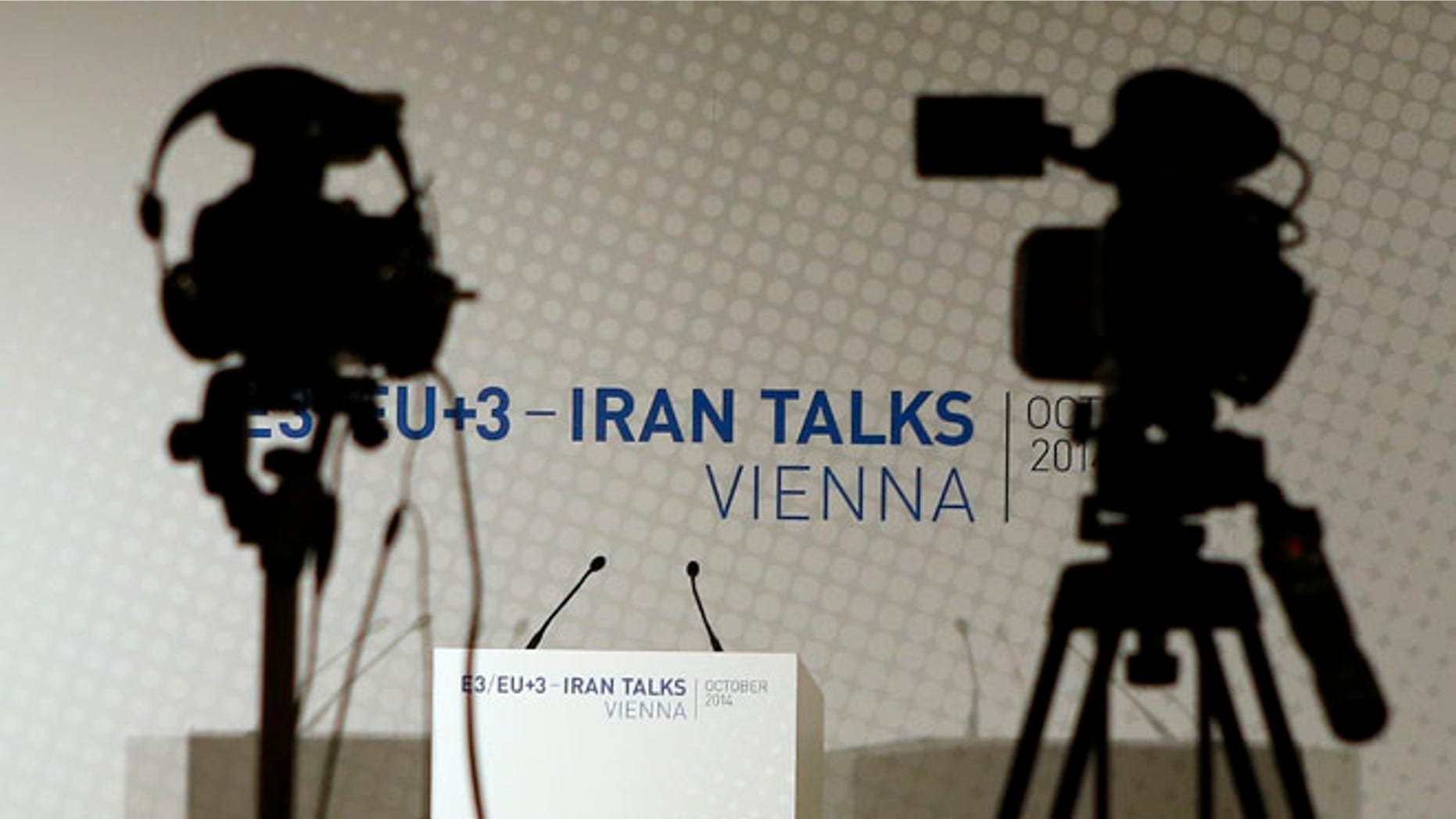 FILE: Oct. 14, 2014: Video cameras at a news conference between EU foreign policy chief Catherine Ashton and Iranian Foreign Minister Mohammad Javad Zarif, in Vienna.