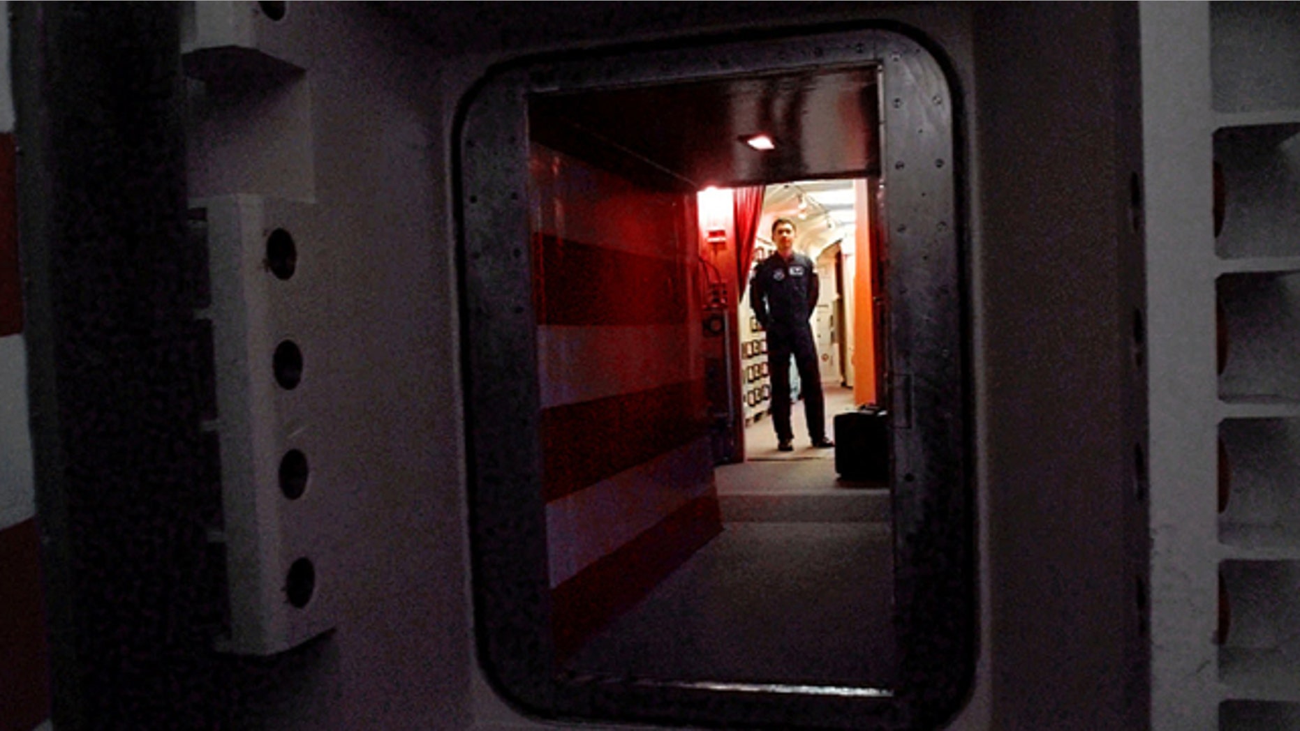 FILE: An Air Force missile crew commander standing at the door of his launch capsule 100-feet under ground where he and his partner are responsible for 10 nuclear-armed ICBM's, in north-central Colorado.