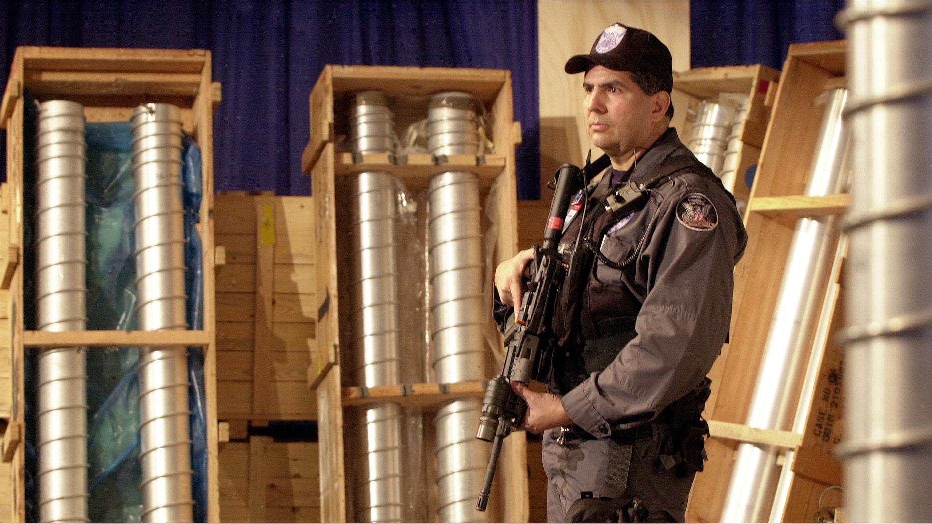 Security team member Pat Galardo guards components of the nuclear weapons program at the Y-12 National Security Complex in Oak Ridge, Tennessee, March 15, 2004.