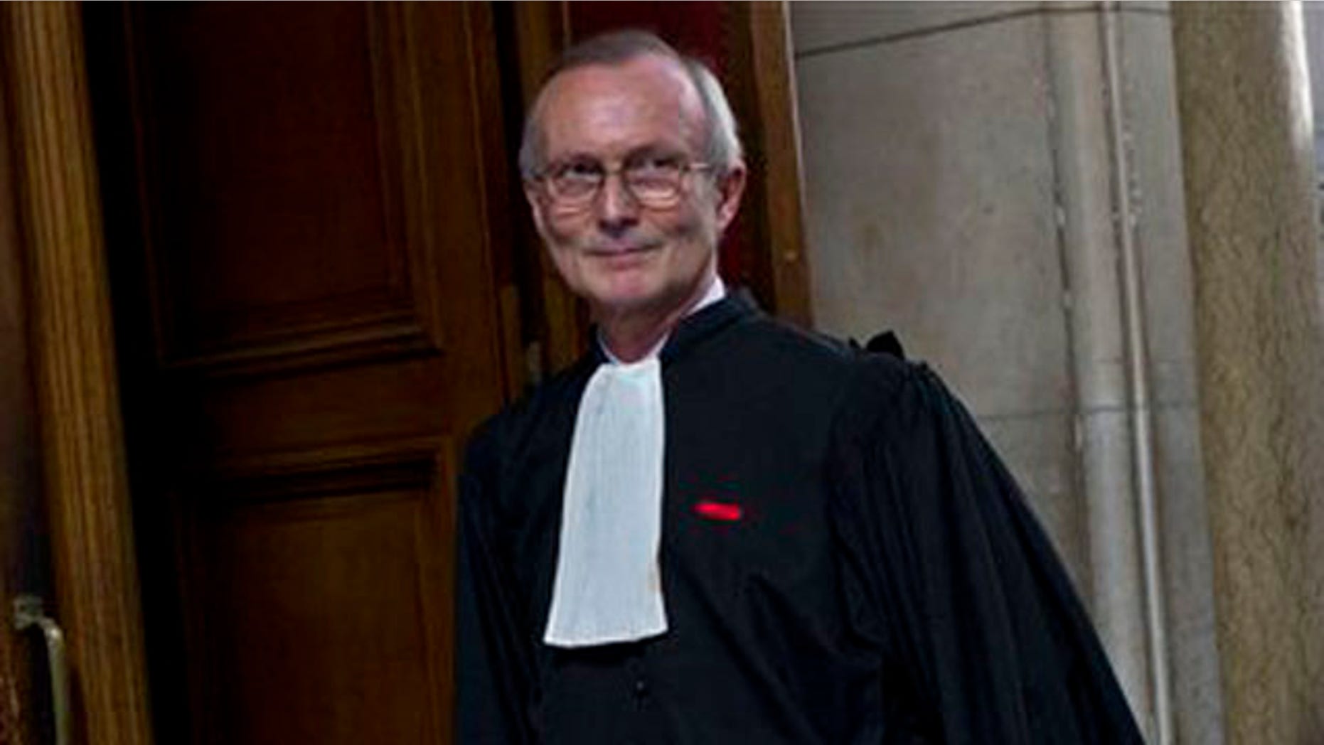 March 29, 2012: French nuclear physicist Adlene Hicheur's lawyer Patrick Baudoin is seen at the Paris courthouse, in Paris where Hicheur goes on trial charged with criminal association as part of a terrorist enterprise.