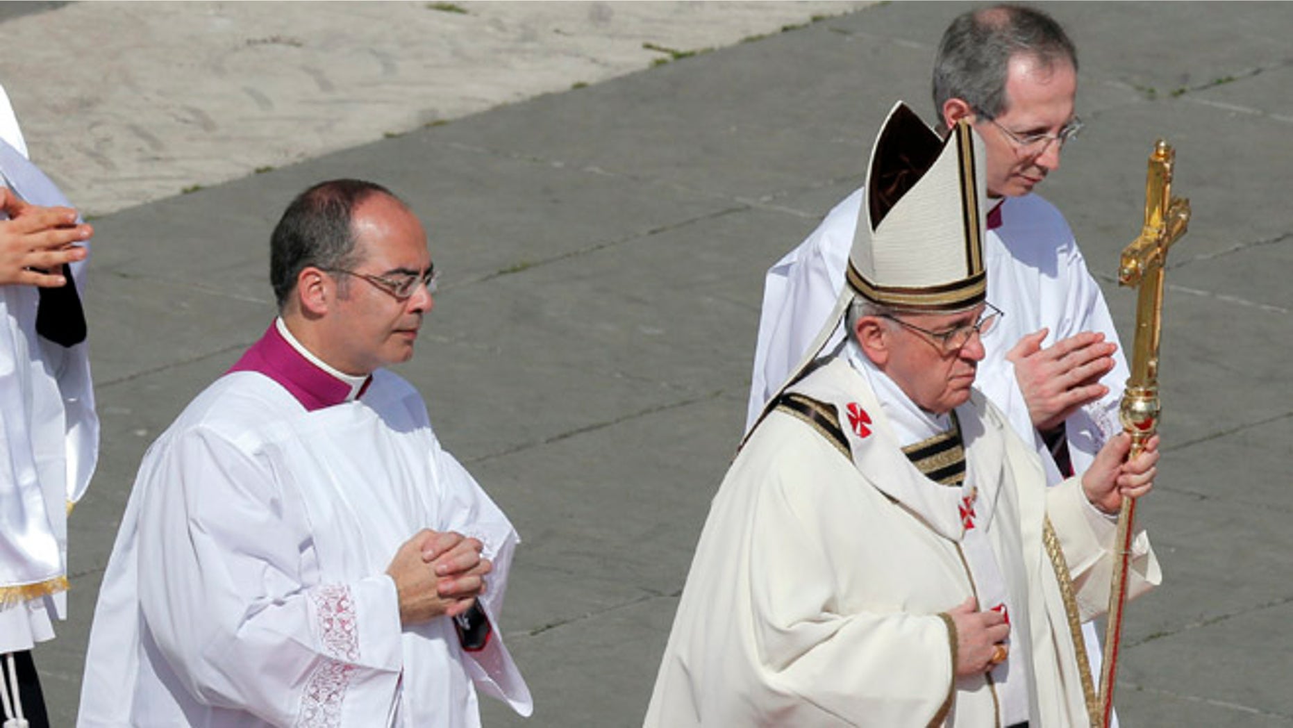 March 19, 2013: Pope Francis holds his pastoral staff as he celebrates his inaugural Mass in St. Peter's Square at the Vatican.
