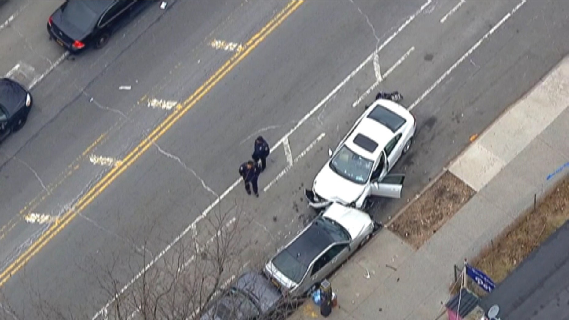 Two children were killed and several other people were injured after a car truck people in Brooklyn on Monday. (