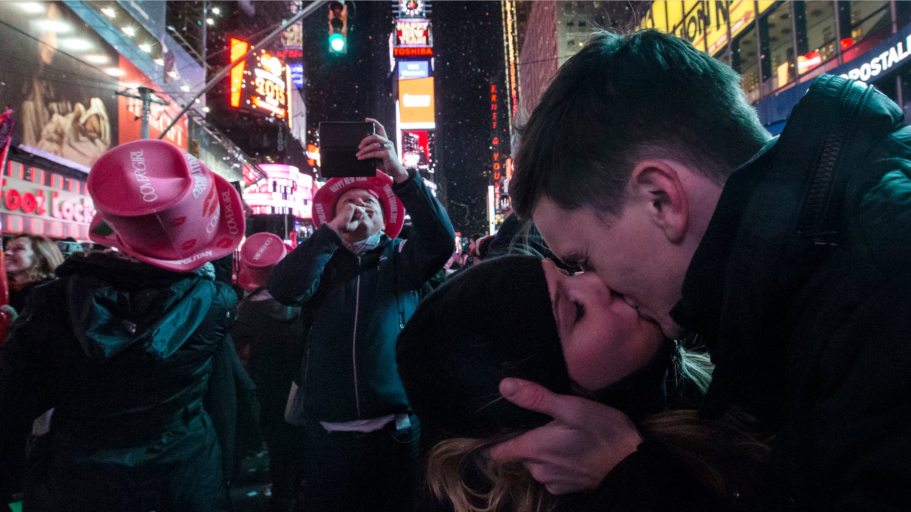 Jan. 1, 2015: Sean Reilly and Emily Verselin share a kiss at midnight in Times Square during a New Year's Eve celebration