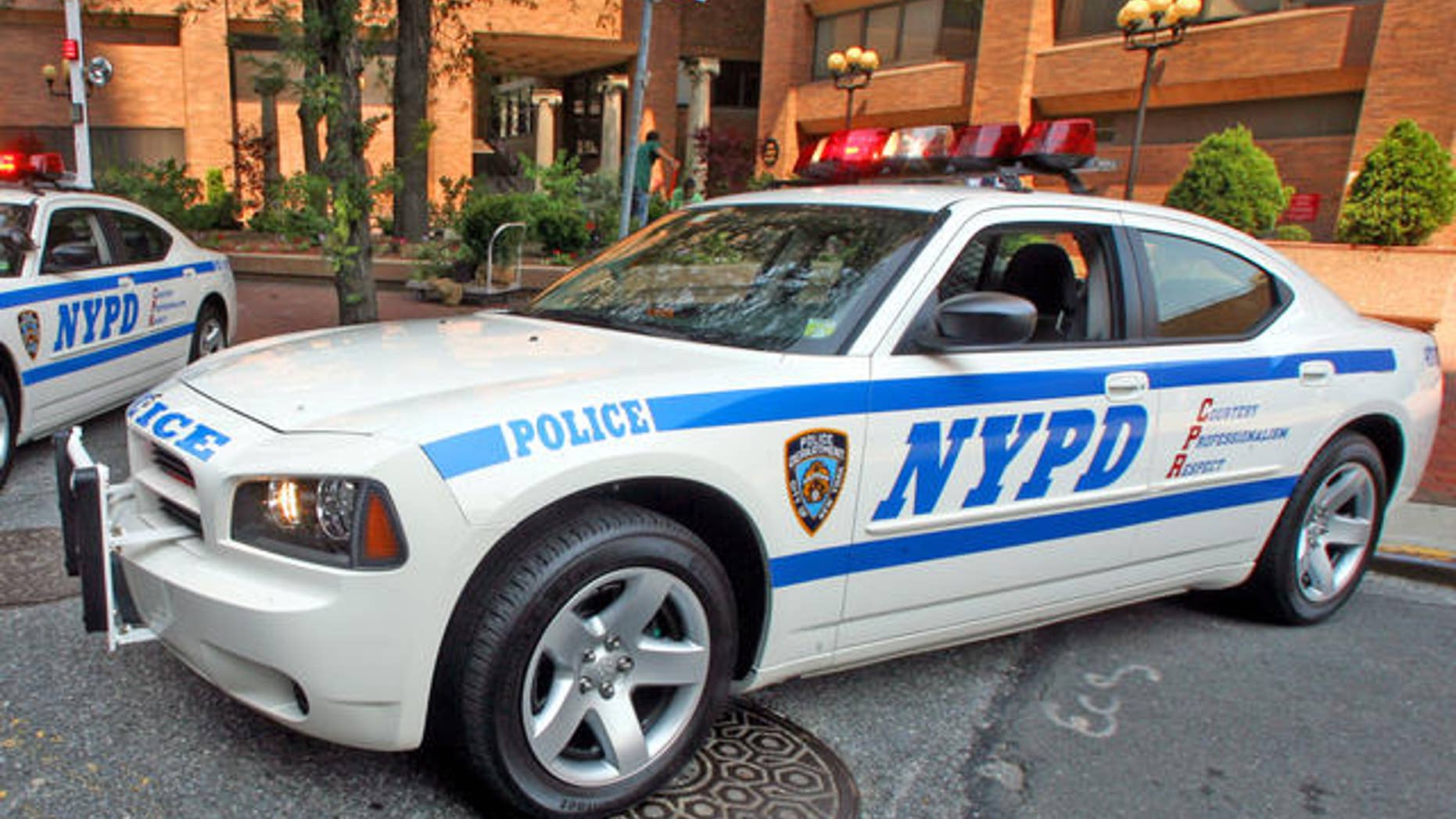 The new police cruisers, a 2006 Dodge Charger, are on display at New York City Police Department's headquarters in New York, Monday, Aug. 14, 2006. Police Commissioner Raymond Kelly unveiled the new police cruiser during a news conference Monday. (AP Photo/Mary Altaffer)