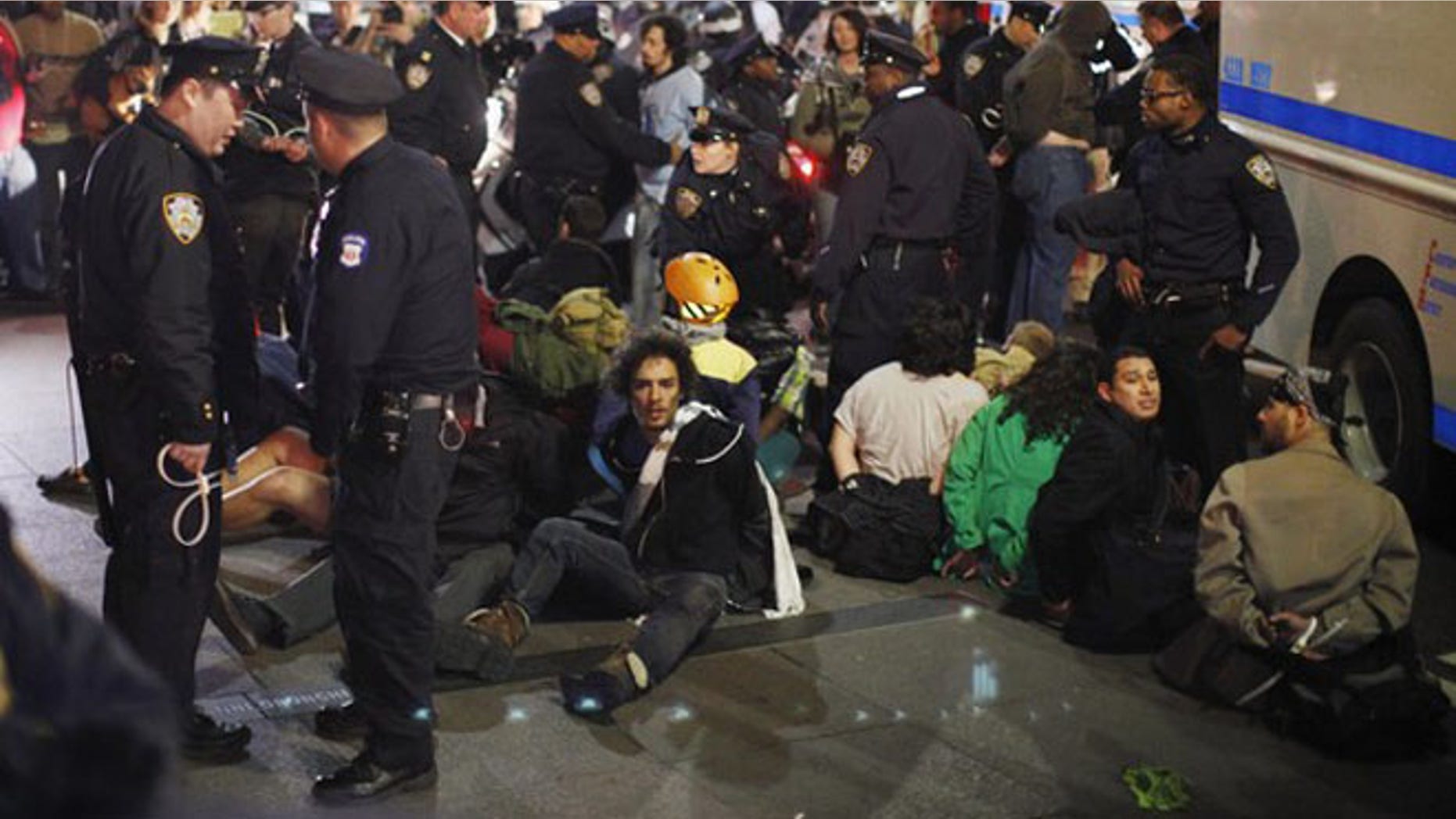 March 17, 2012: Members of the Occupy Wall Street movement are arrested by NYPD officers after protesting at Zuccotti park in New York.