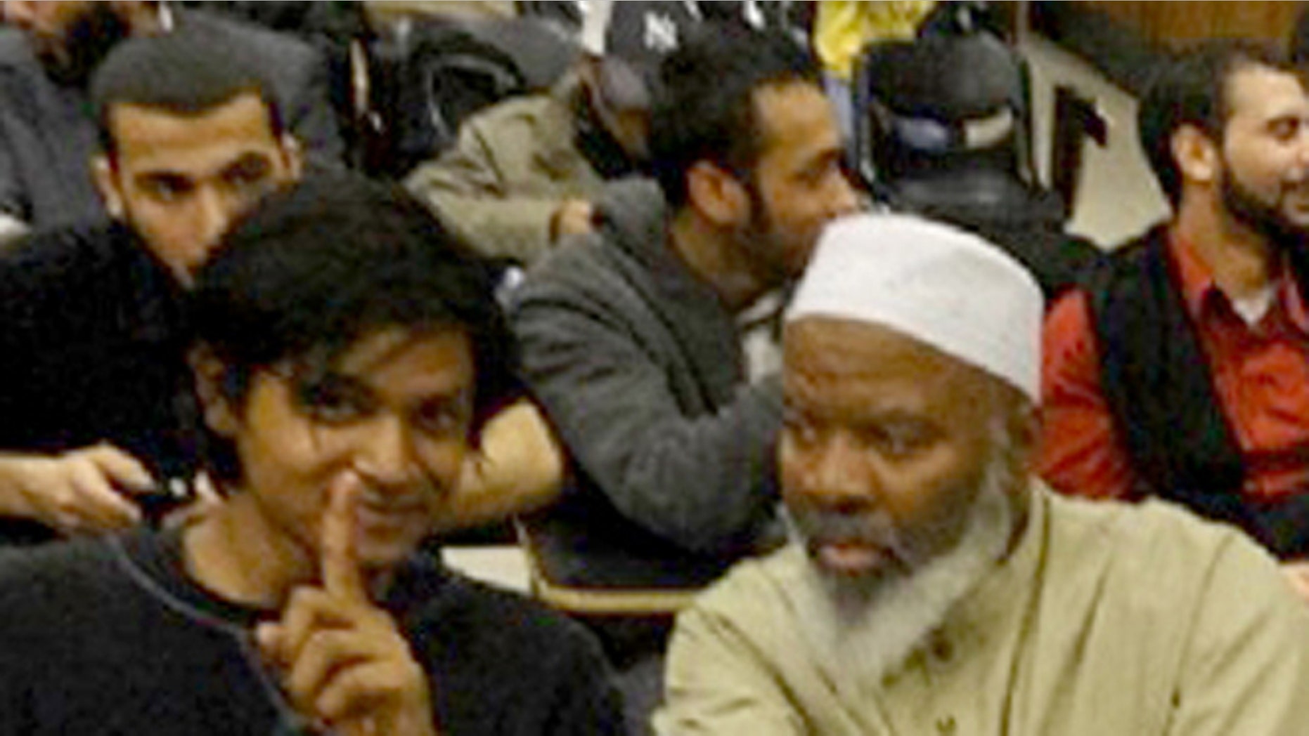May 3, 2012: This handout photo provided by Jamill Noorata shows Shamiur Rahman, left, sitting with Siraj Wahhaj at John Jay Community College in New York.