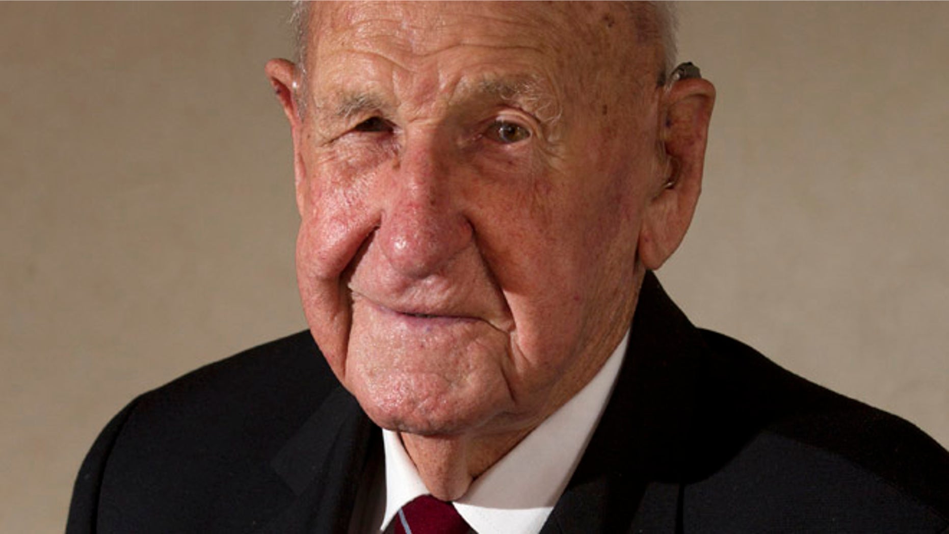 March 3: Veteran Les Munro poses for a photo at his home in Tauranga, New Zealand.