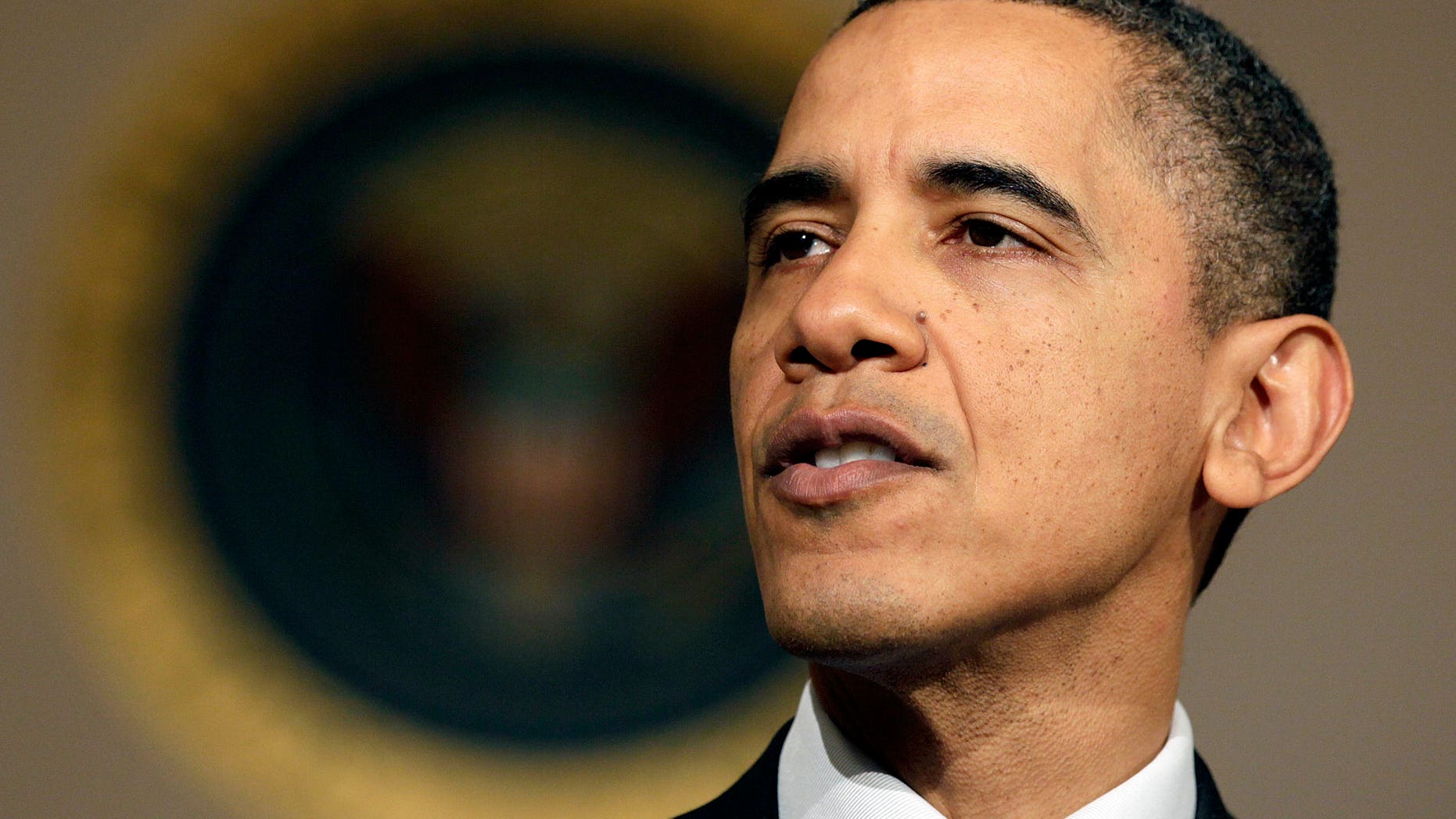 President Barack Obama makes a statement on the resignation of Egypt's President Hosni Mubarak in the Grand Foyer at the White House in Washington, Friday, Feb. 11, 2011. (AP)