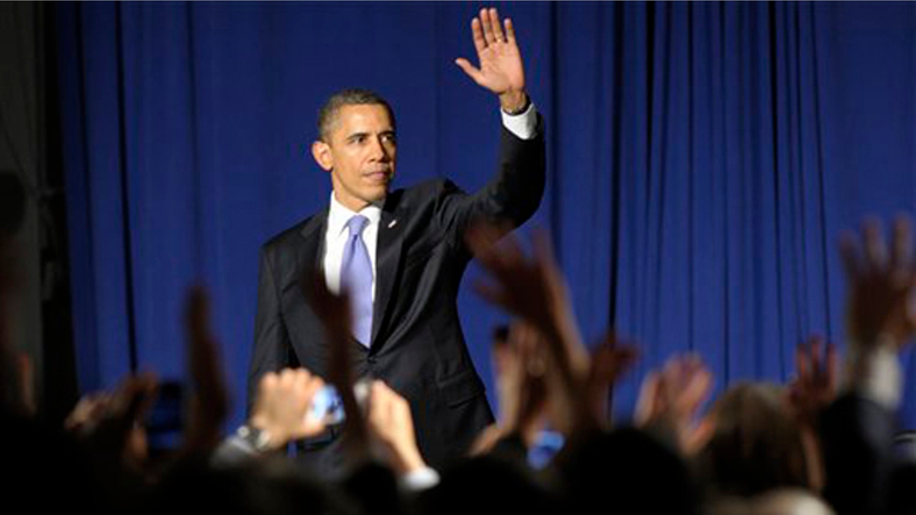 March 1, 2012: President Obama waves to the crowd after speaking at a fundraiser in New York City.