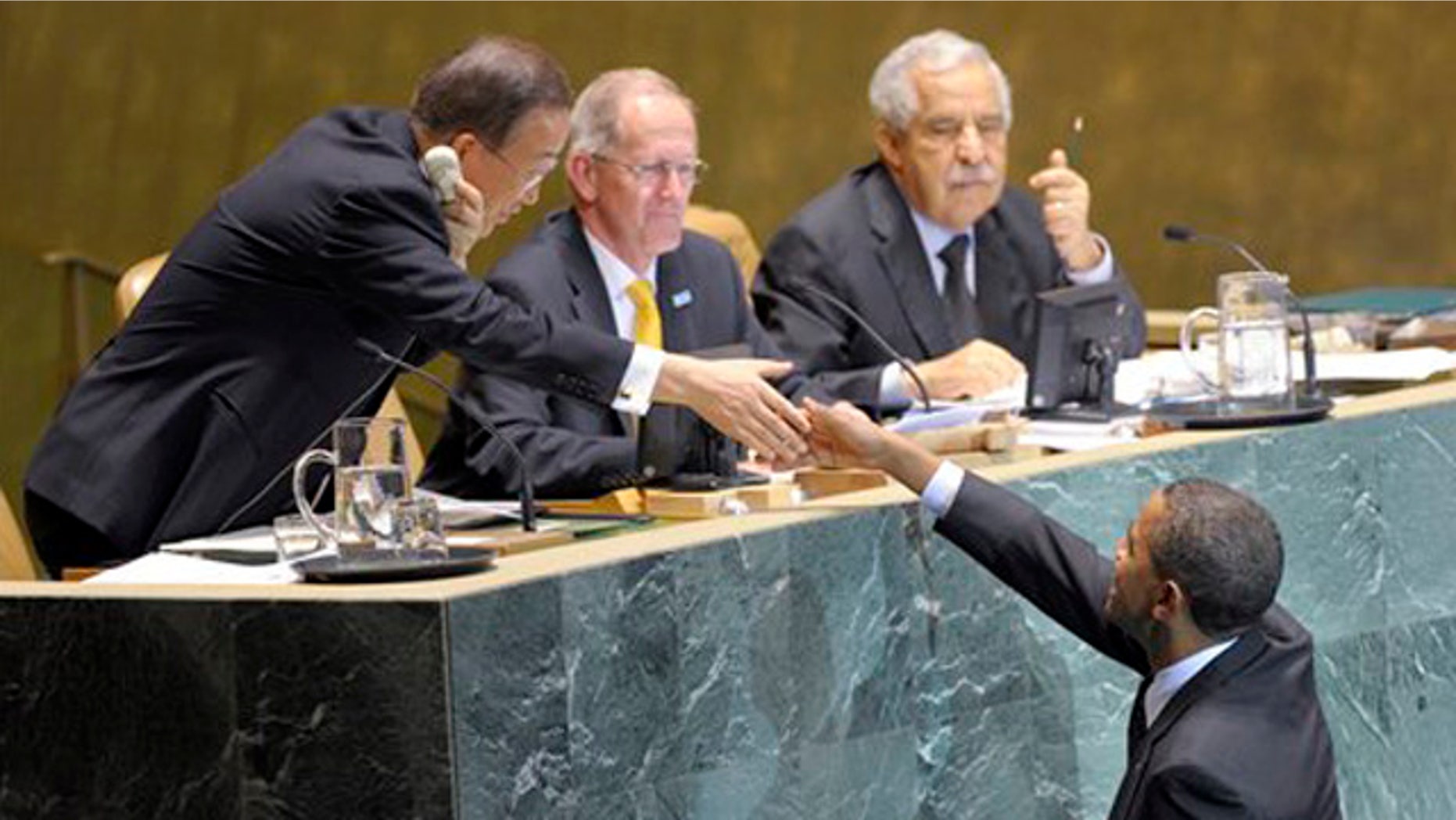 Sept. 22, 2010: President Barack Obama reaches to shake the hand of UN Secretary General Ban-Ki Moon, left, before he delivers remarks at the Millennium Development Goals Conference at the United Nations.