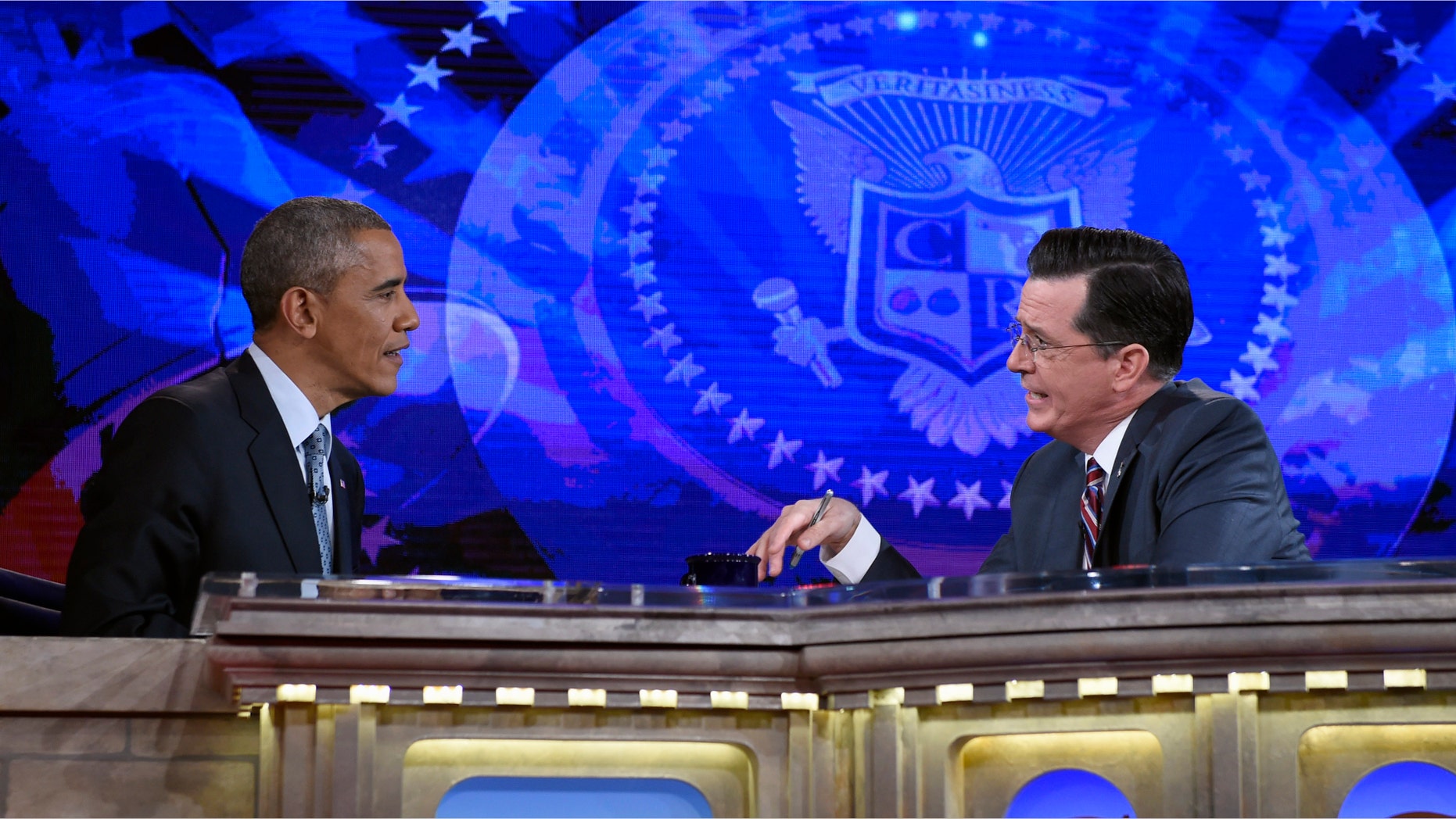 Dec. 8, 2014: President Barack Obama talks with Stephen Colbert of The Colbert Report during a taping of the program in Lisner Auditorium at George Washington University.