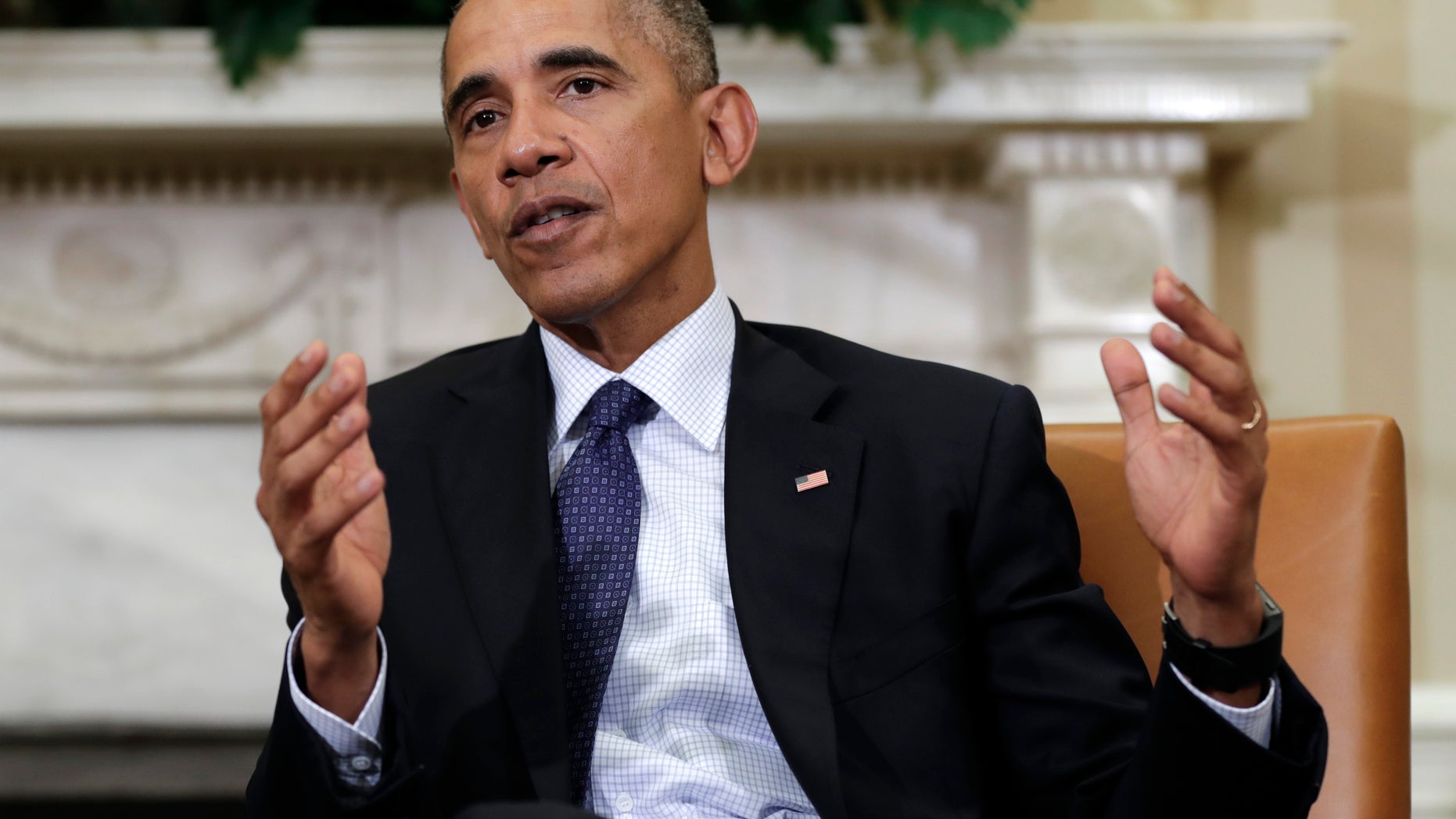 Oct. 21, 2016: President Barack Obama speaks to media in the Oval Office of the White House in Washington.