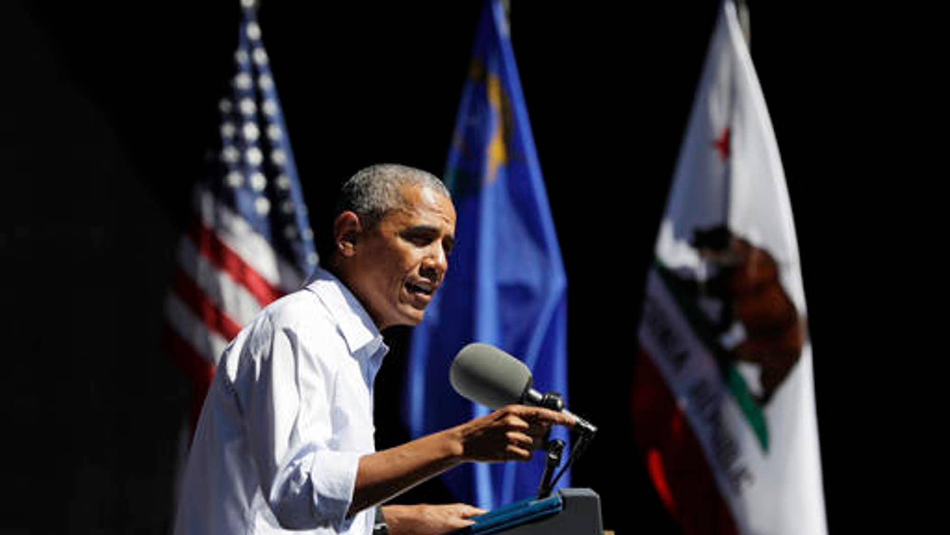FILE--In this Aug. 31, 2016, President Barack Obama speaks during the 20th annual Lake Tahoe Summit at the Lake Tahoe Outdoor Arena at Harveys, in Stateline, Nev. Two weeks after President Obama made his first trip to Lake Tahoe with an impassioned plea about the inseparable link between the region's economy and its environment, Congress has taken a big step toward spending hundreds of millions of dollars to restore and protect the alpine lake over the next 10 years. (AP Photo/Carolyn Kaster, file)